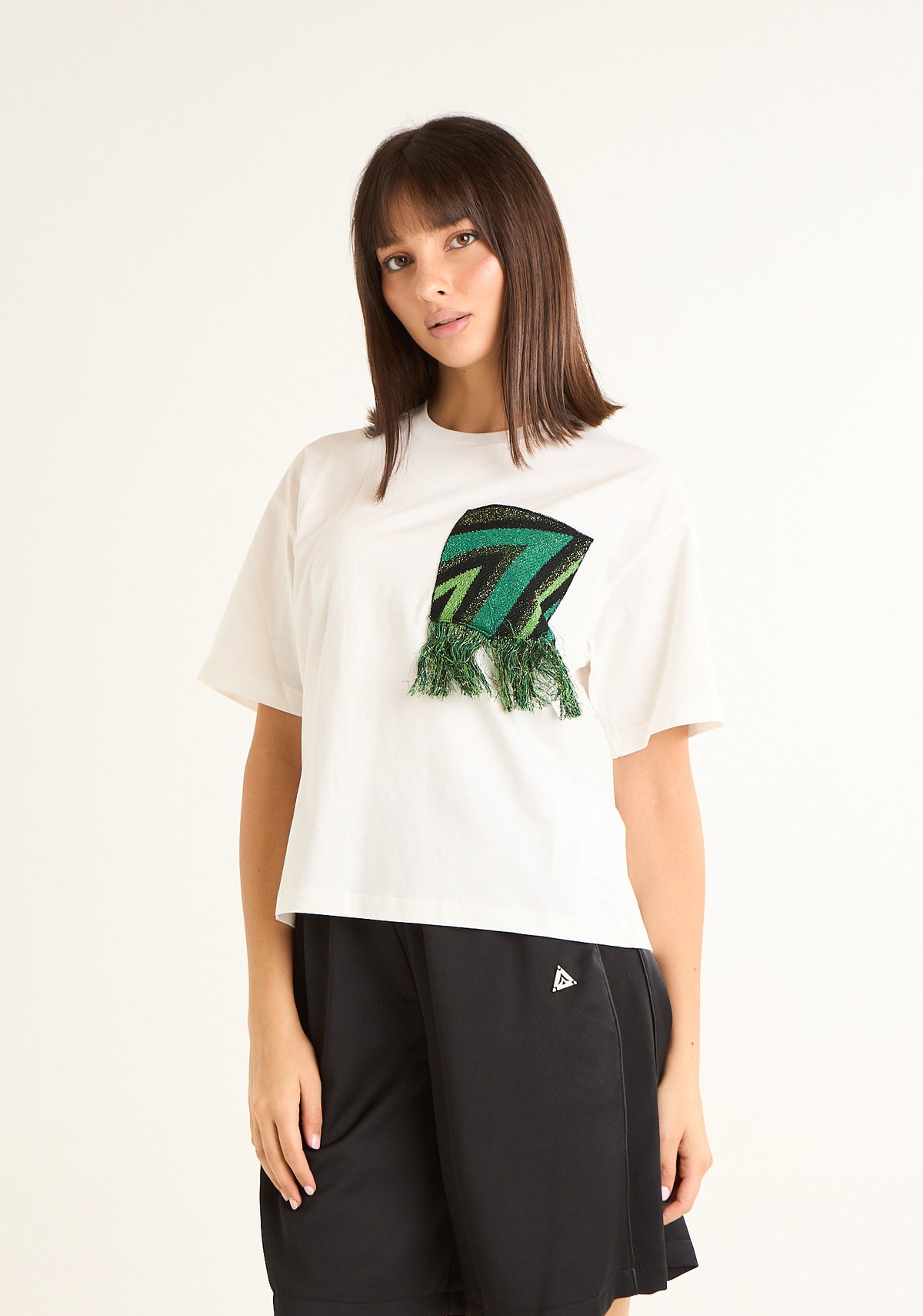 T-shirt con tasca decorativa