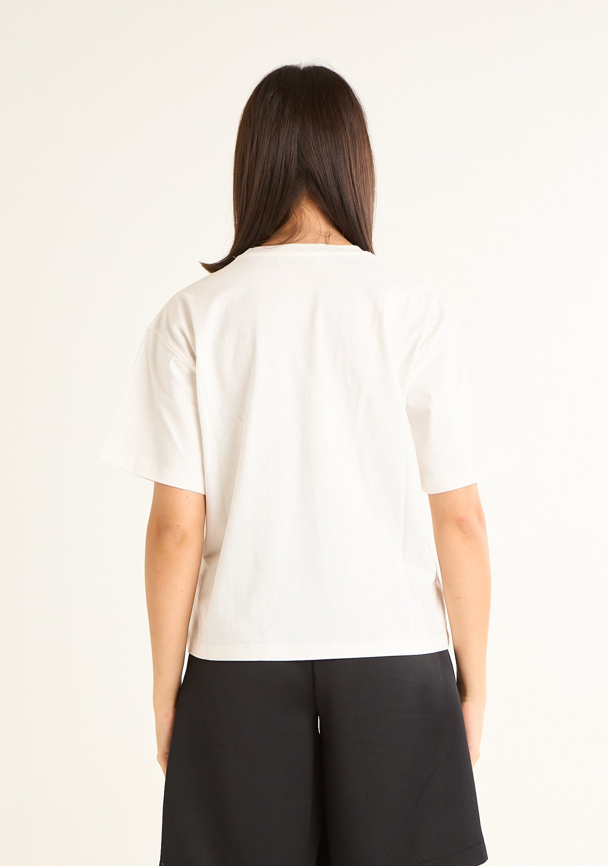 T-shirt con tasca decorativa