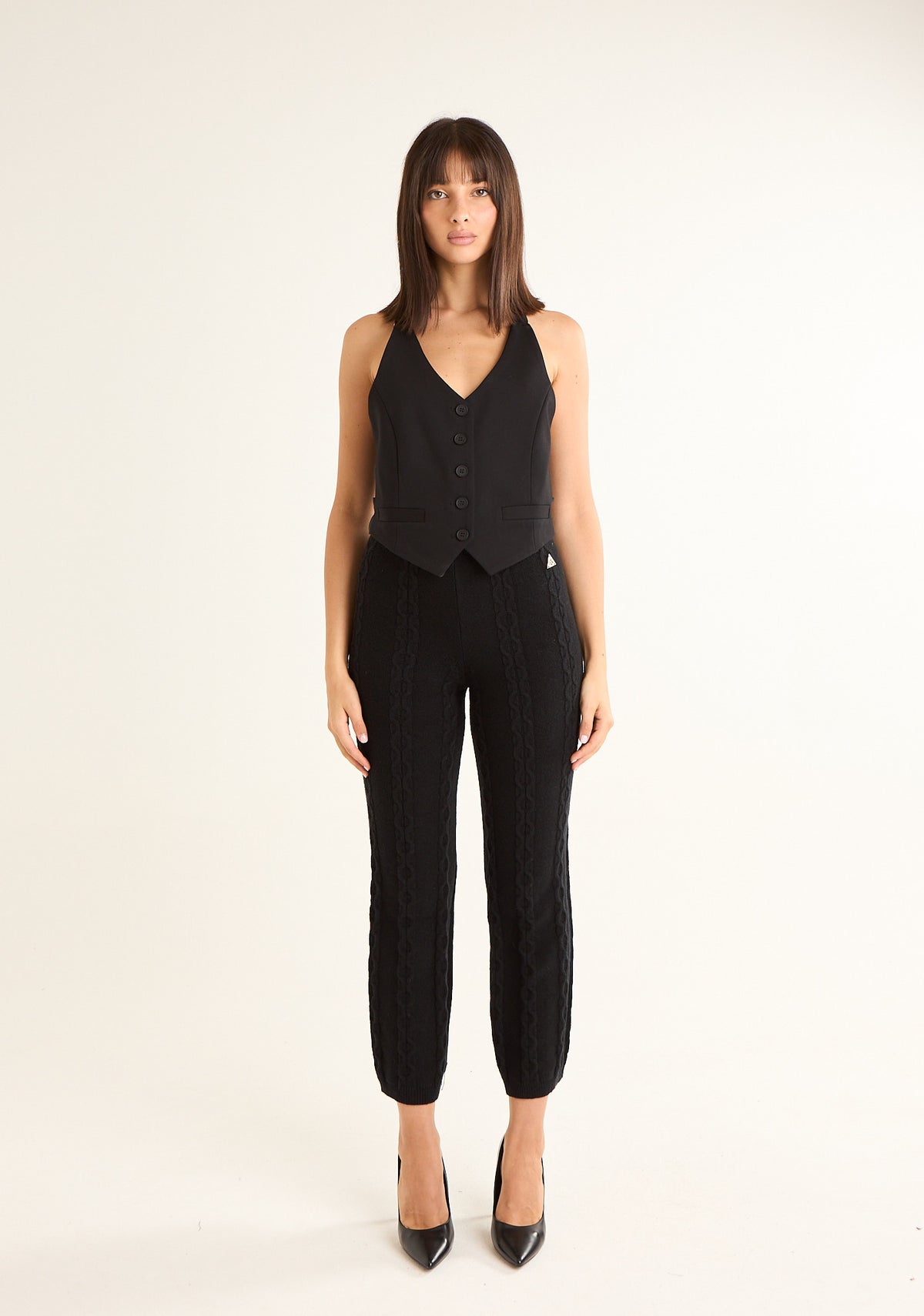 Pantalone in maglia con lavorazione a trecce