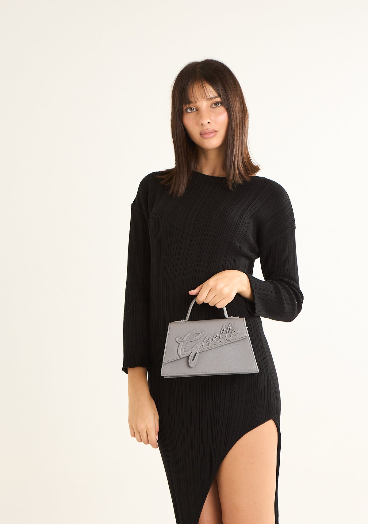 Borsa a mano con patch stile college