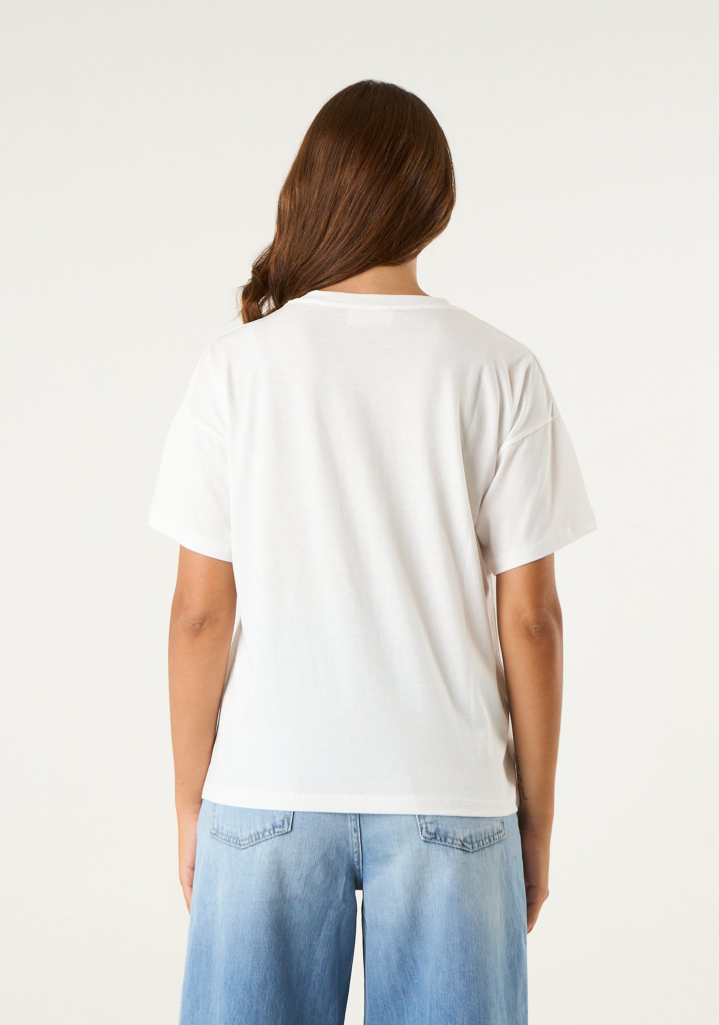 T-shirt con applicazioni frontali