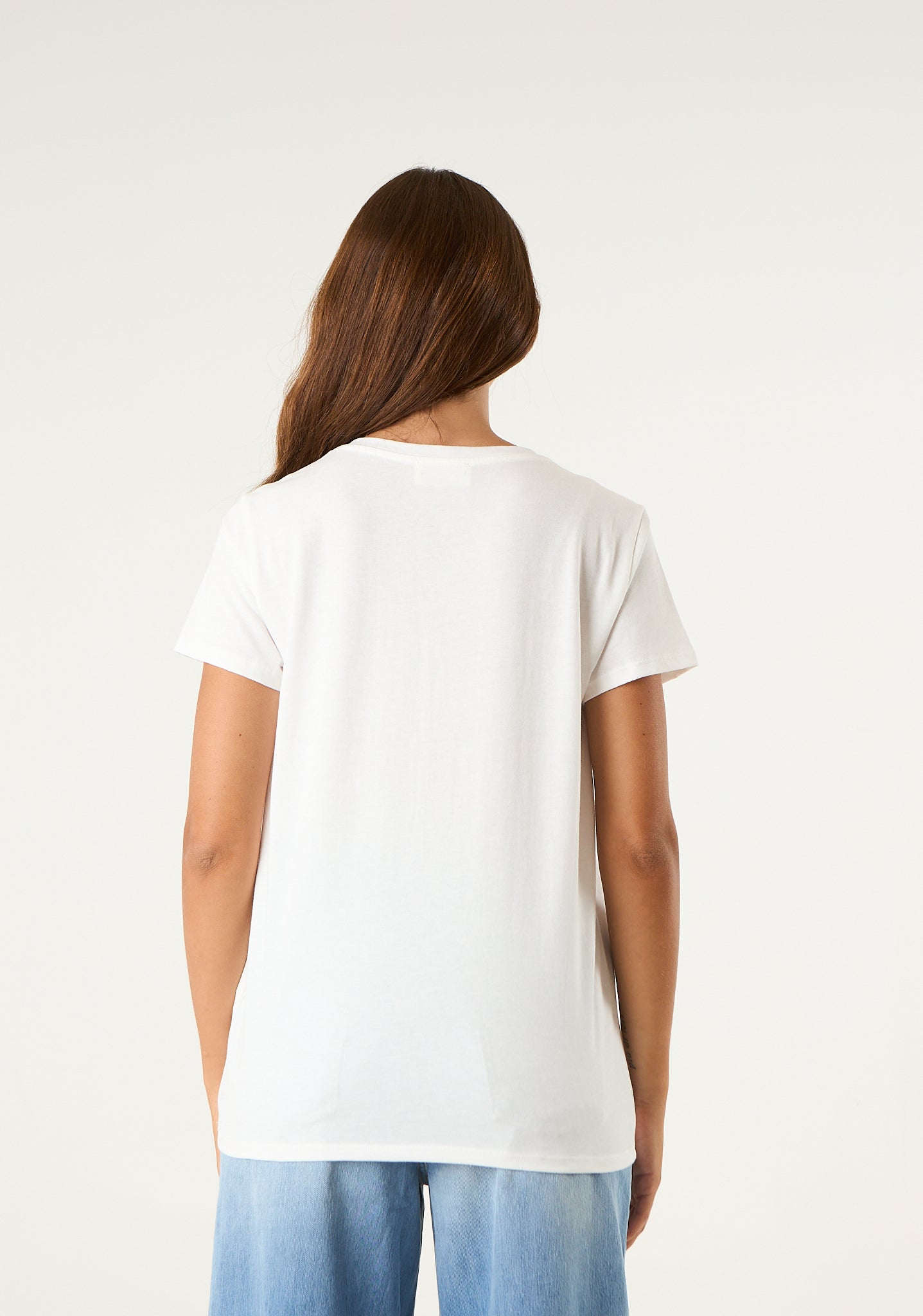 T-shirt con stampa e applicazioni frontali