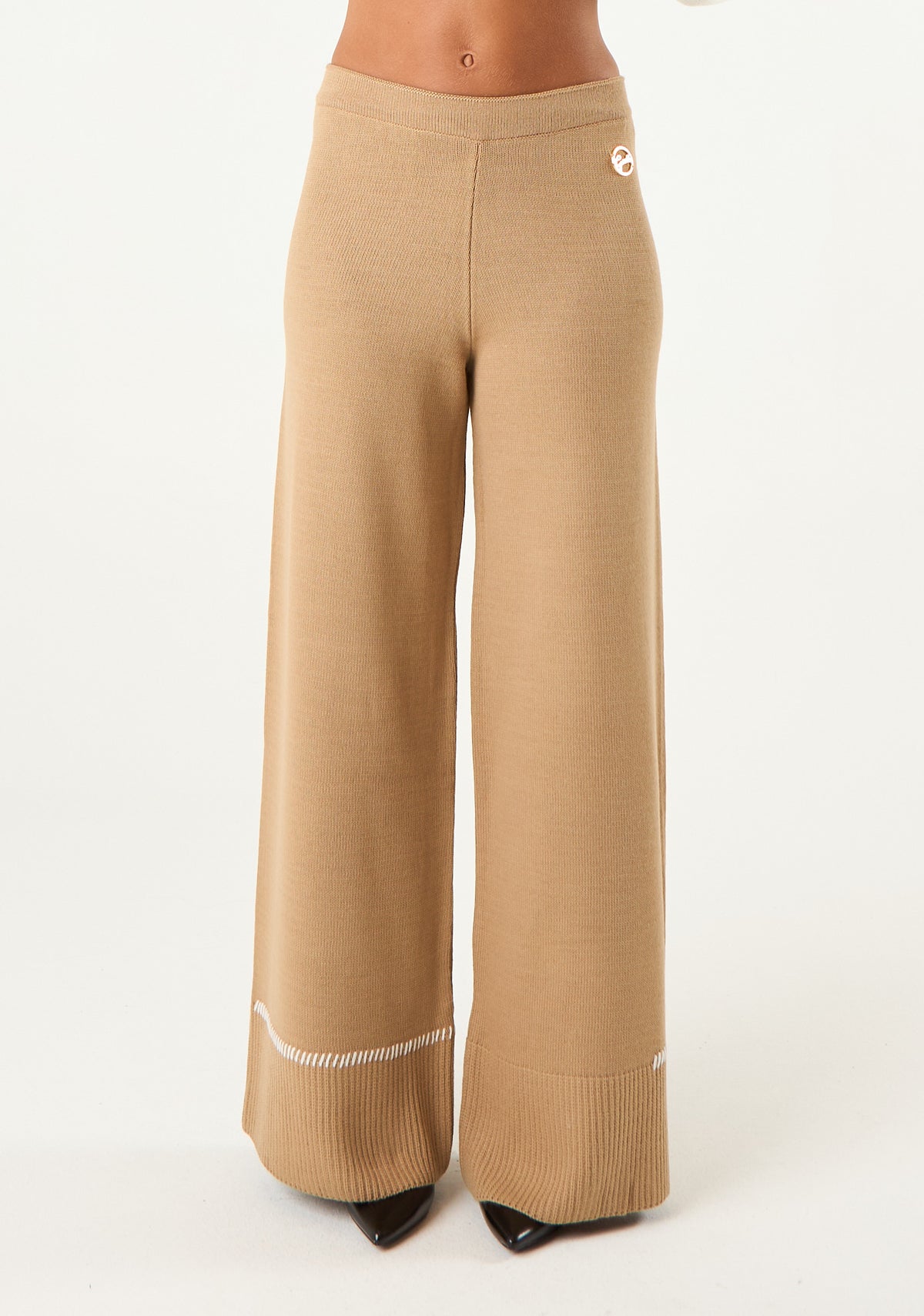 Pantalone palazzo in maglia rasata