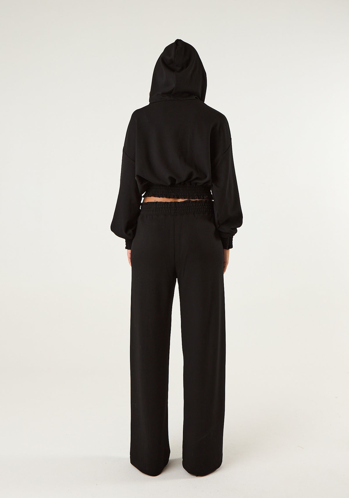 Pantalone palazzo con punto smock