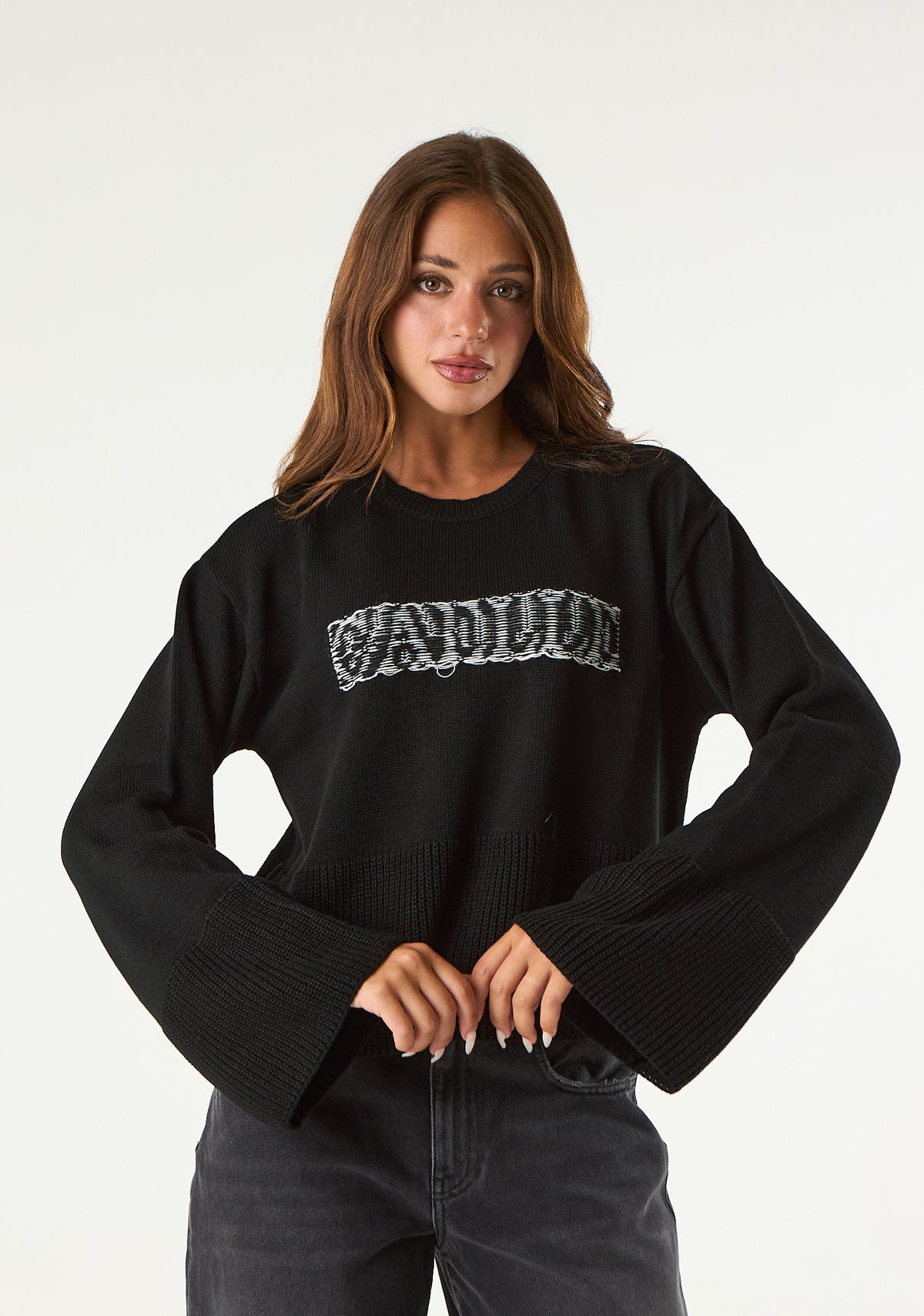 Pullover con maniche lunghe a campana