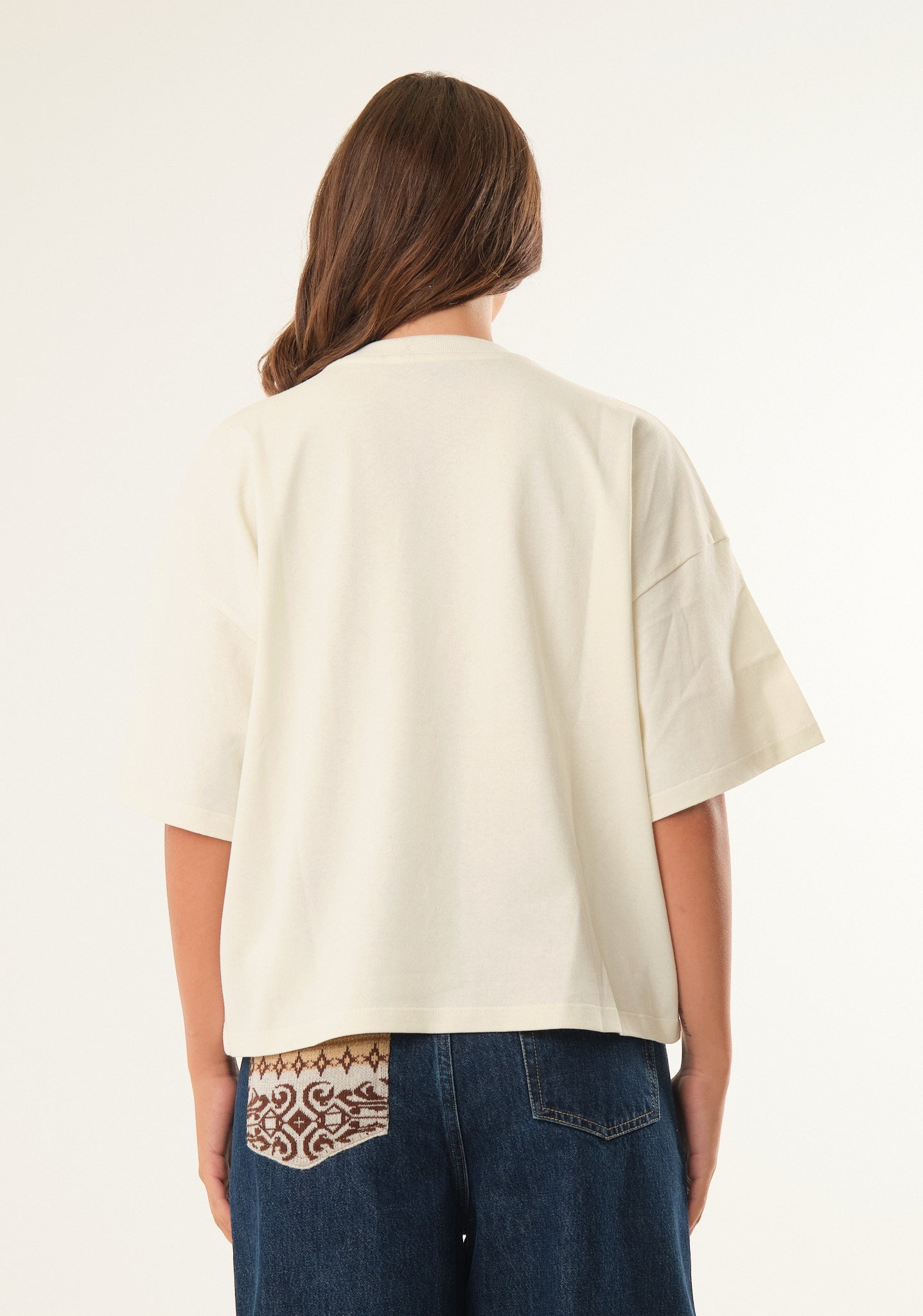 T-shirt con patch logato