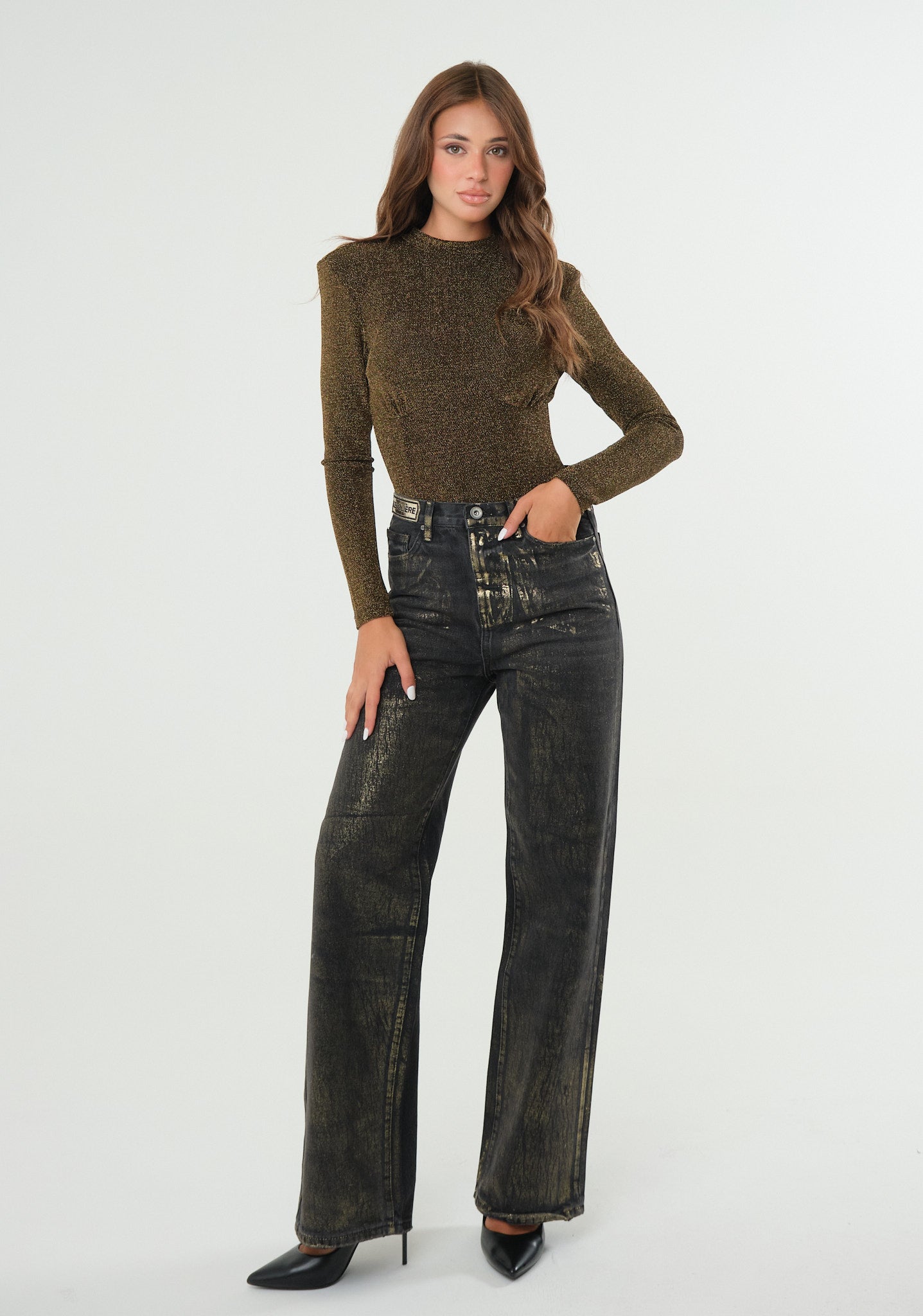 Jeans con spalmatura metal