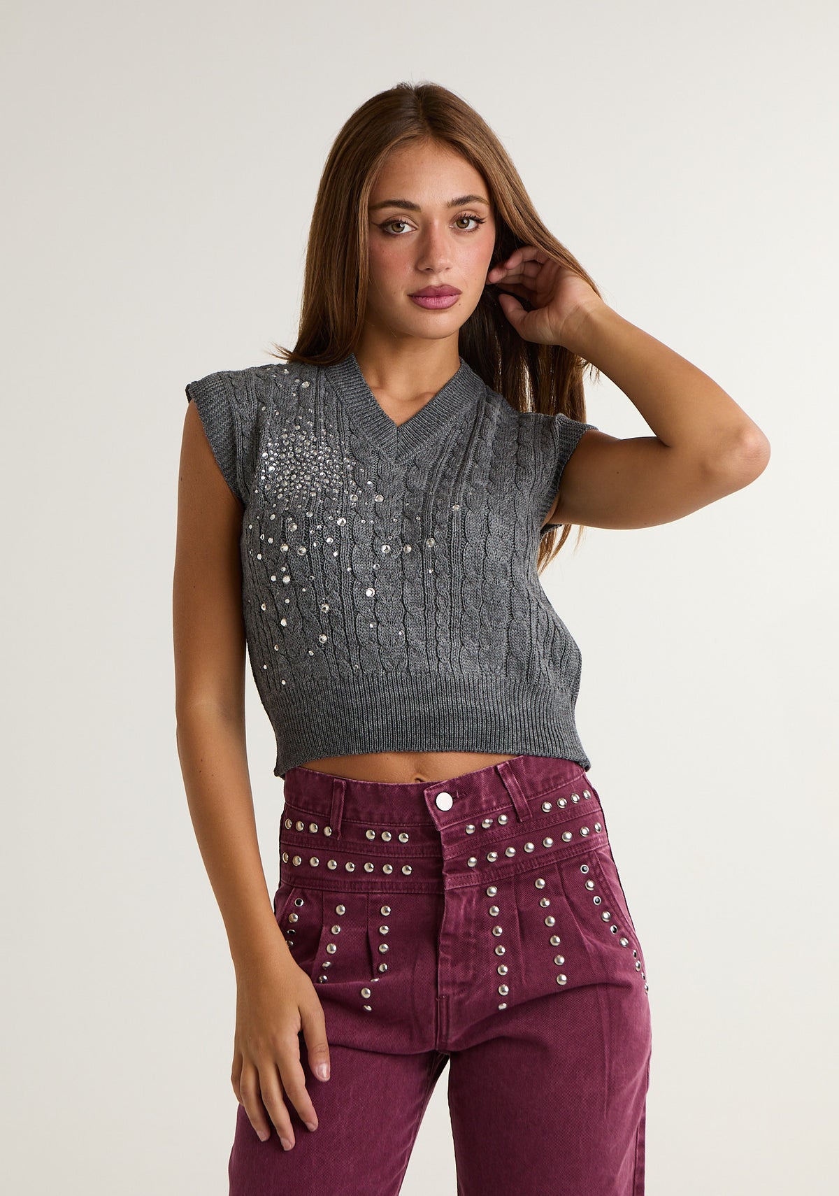 Gilet crop con applicazioni