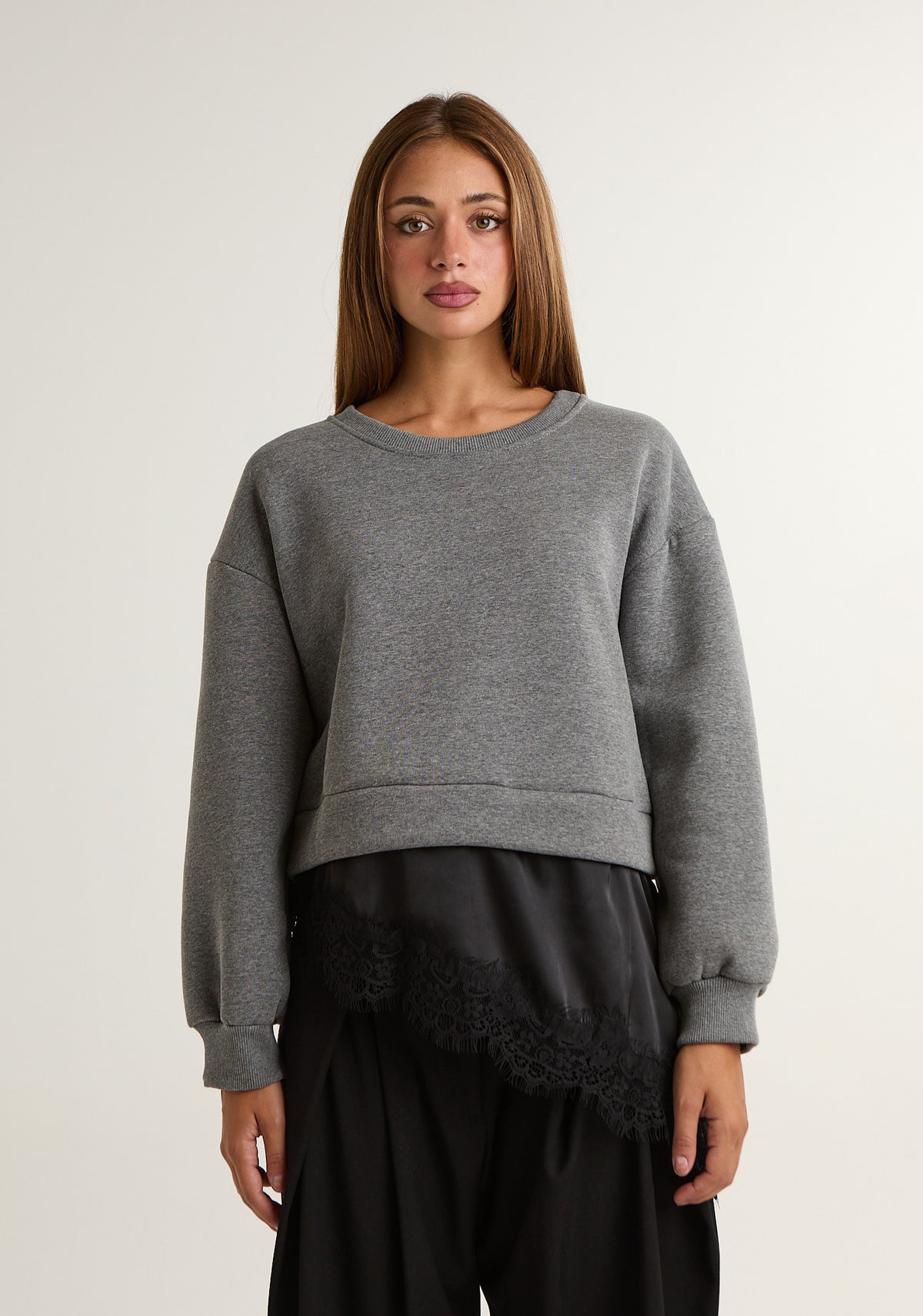 Felpa asimmetrica con pizzo