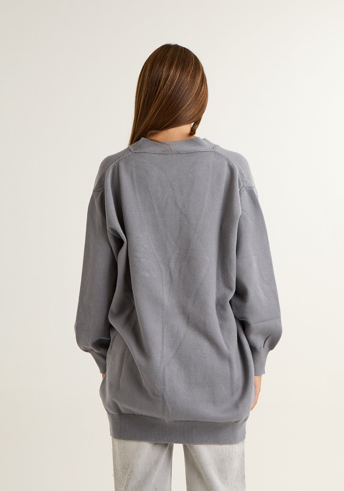 Cardigan con spille preziose