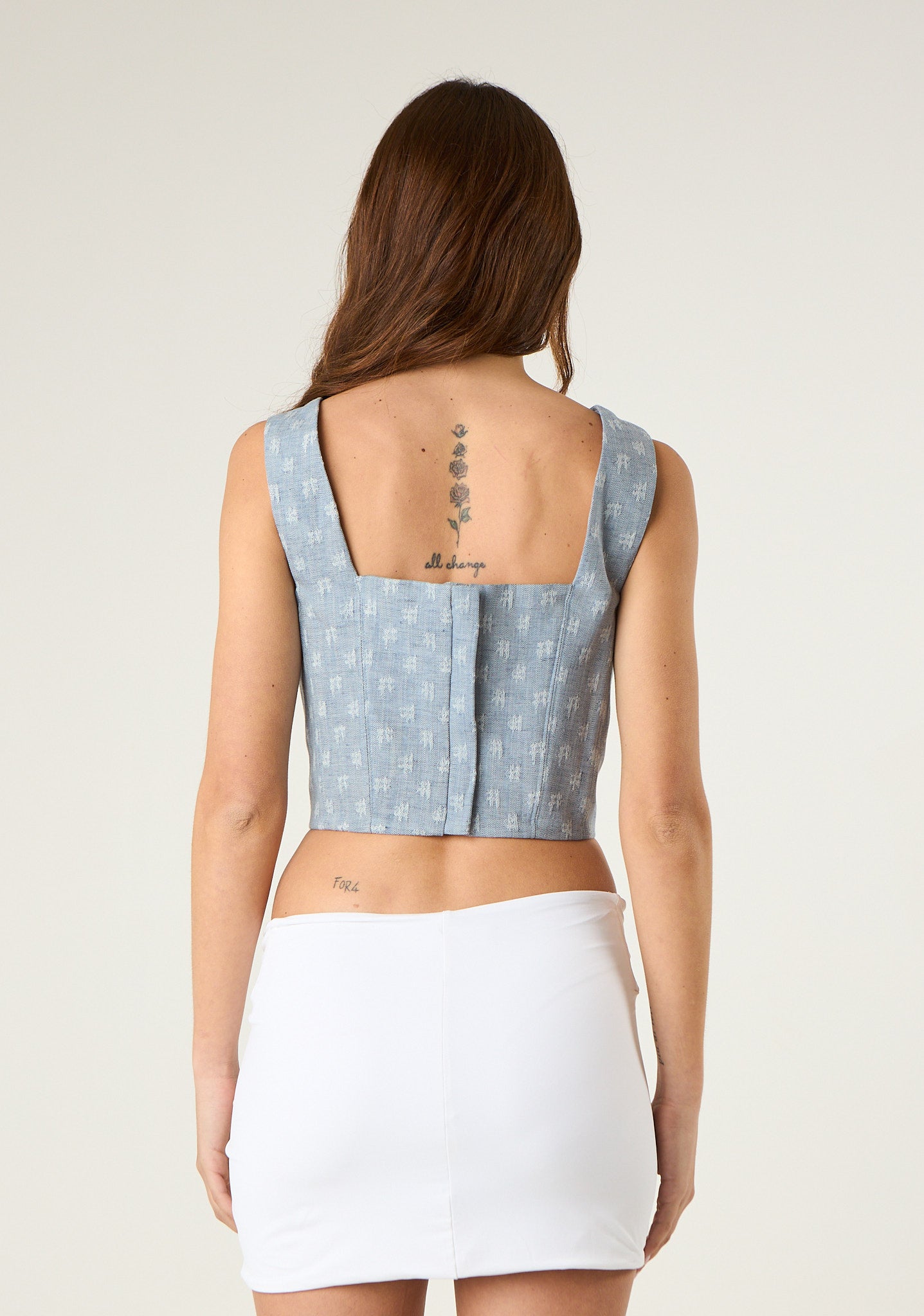 Top strutturato con motivo jacquard