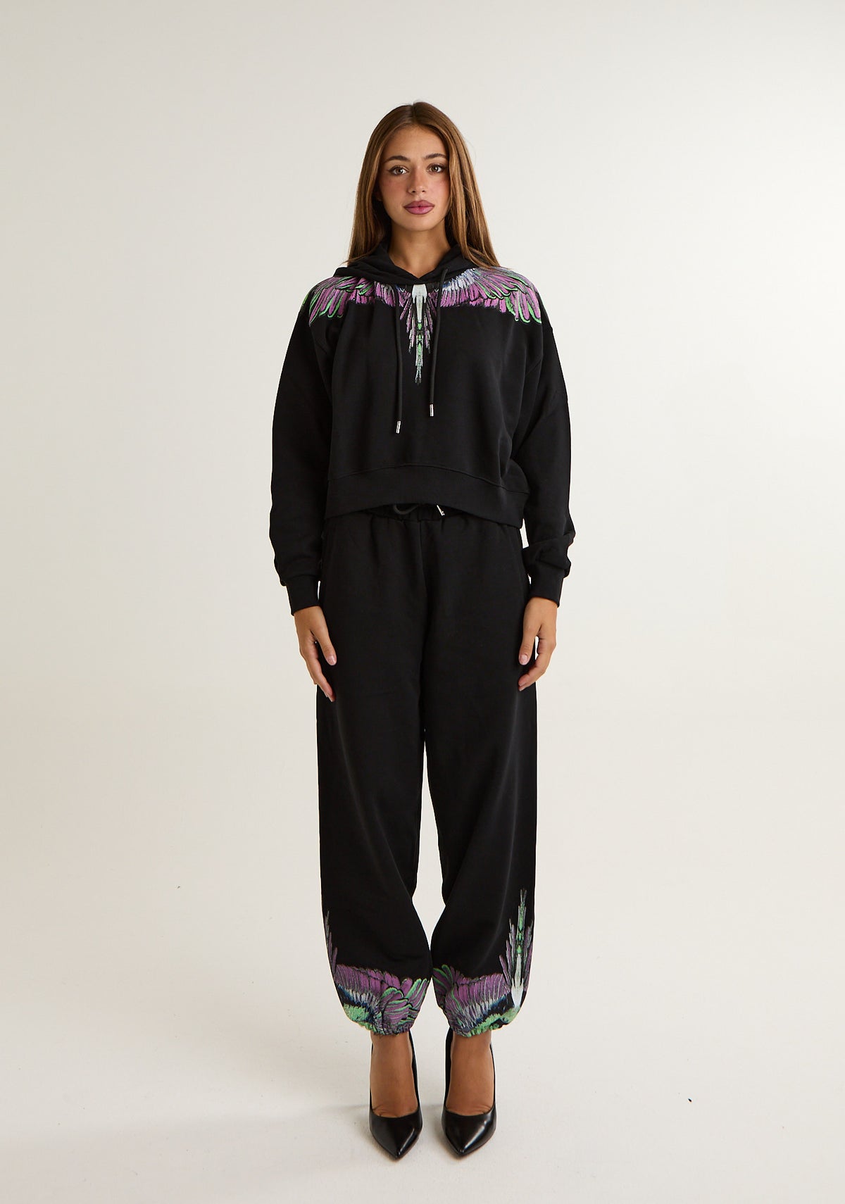 Pantalone tuta con ali colorate