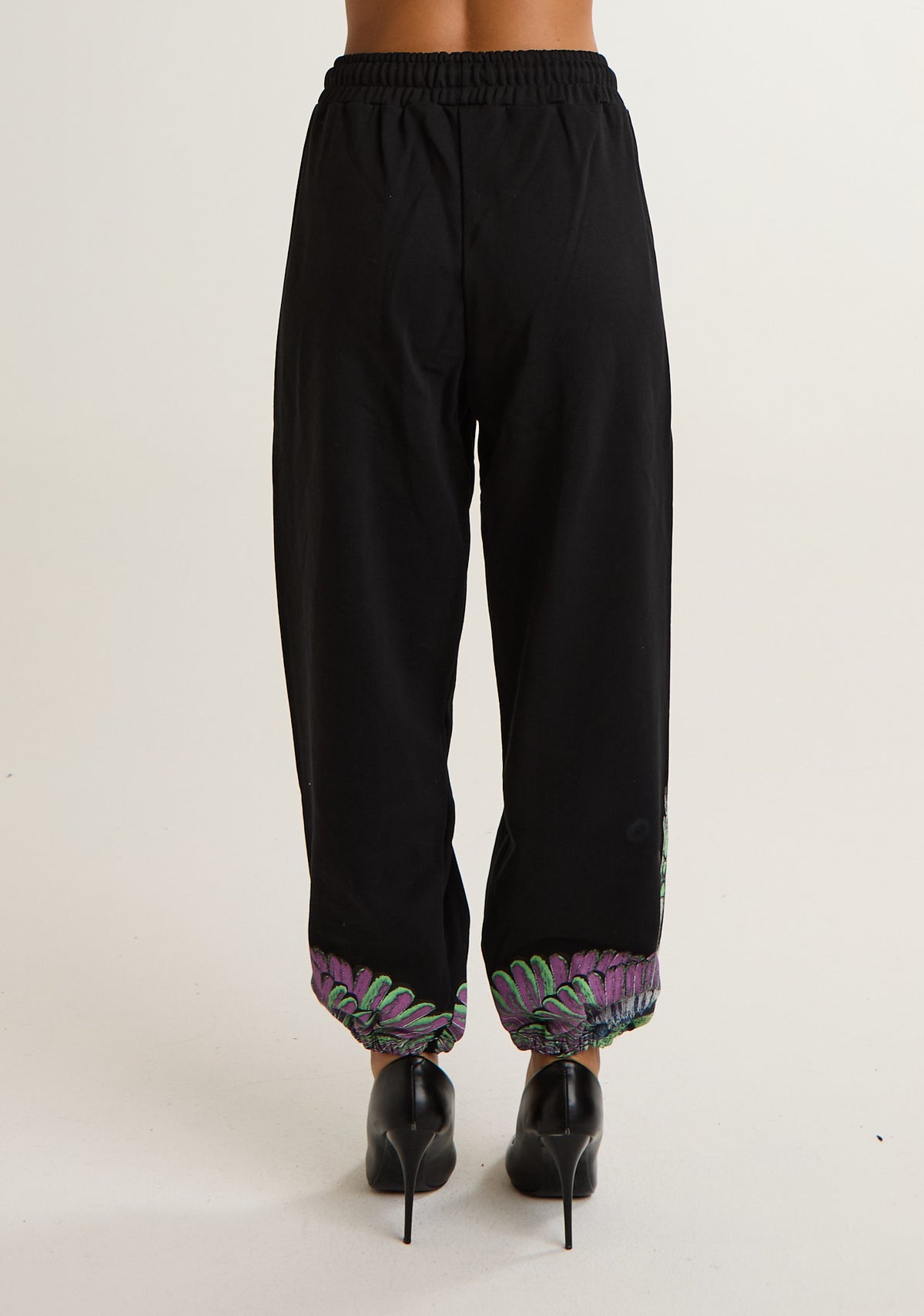 Pantalone tuta con ali colorate