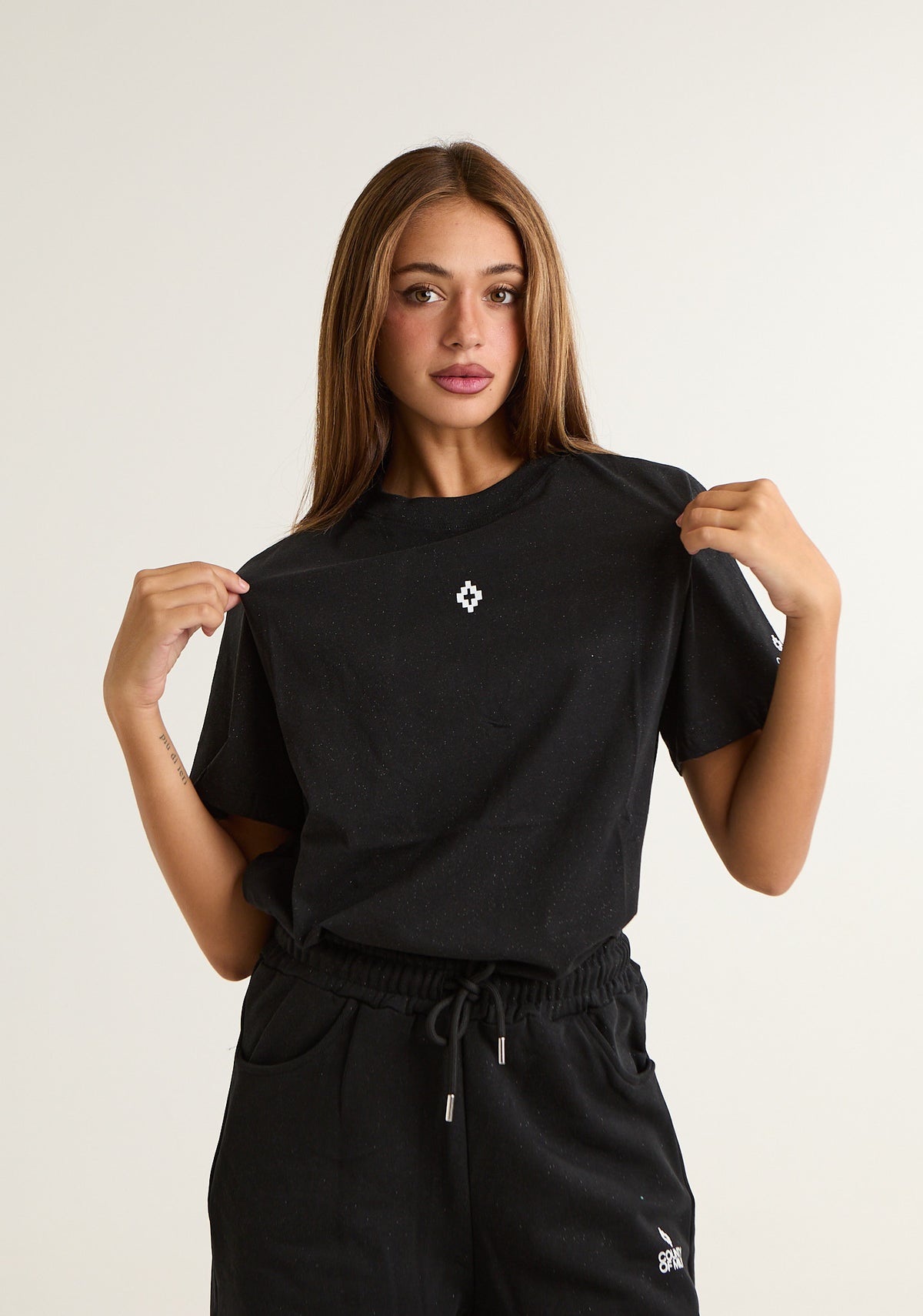 T-shirt con stampa logo piccola