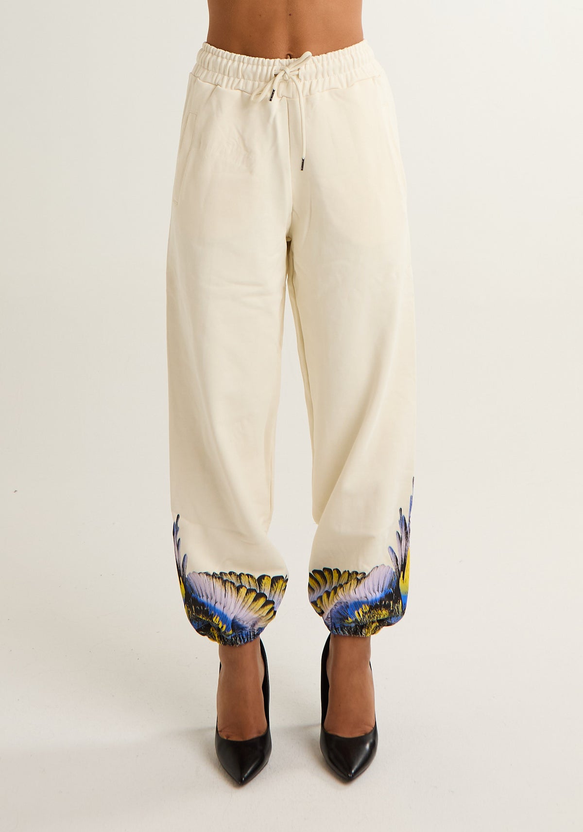 Pantalone tuta con ali colorate