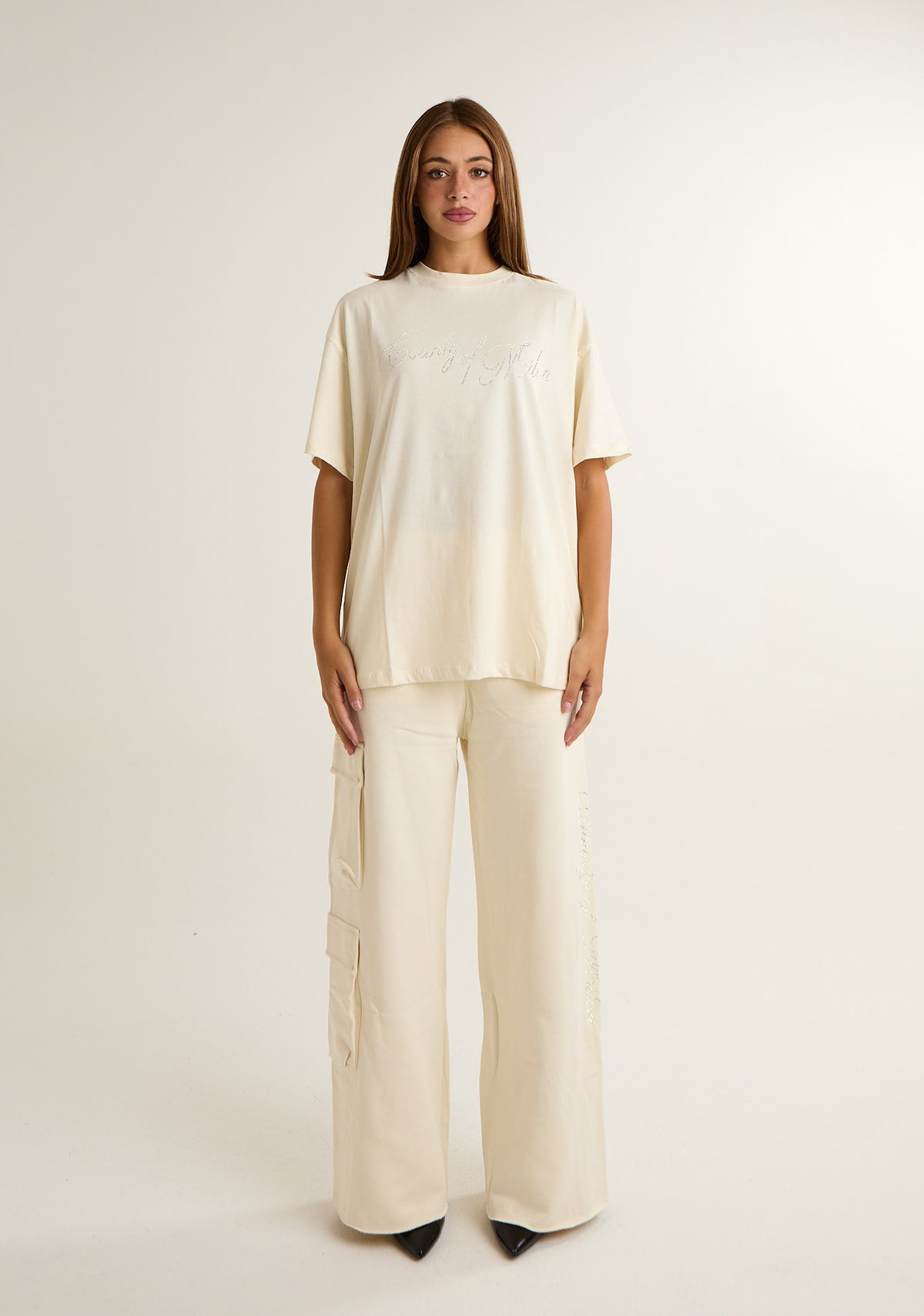 Pantalone con applicazioni laterali logate