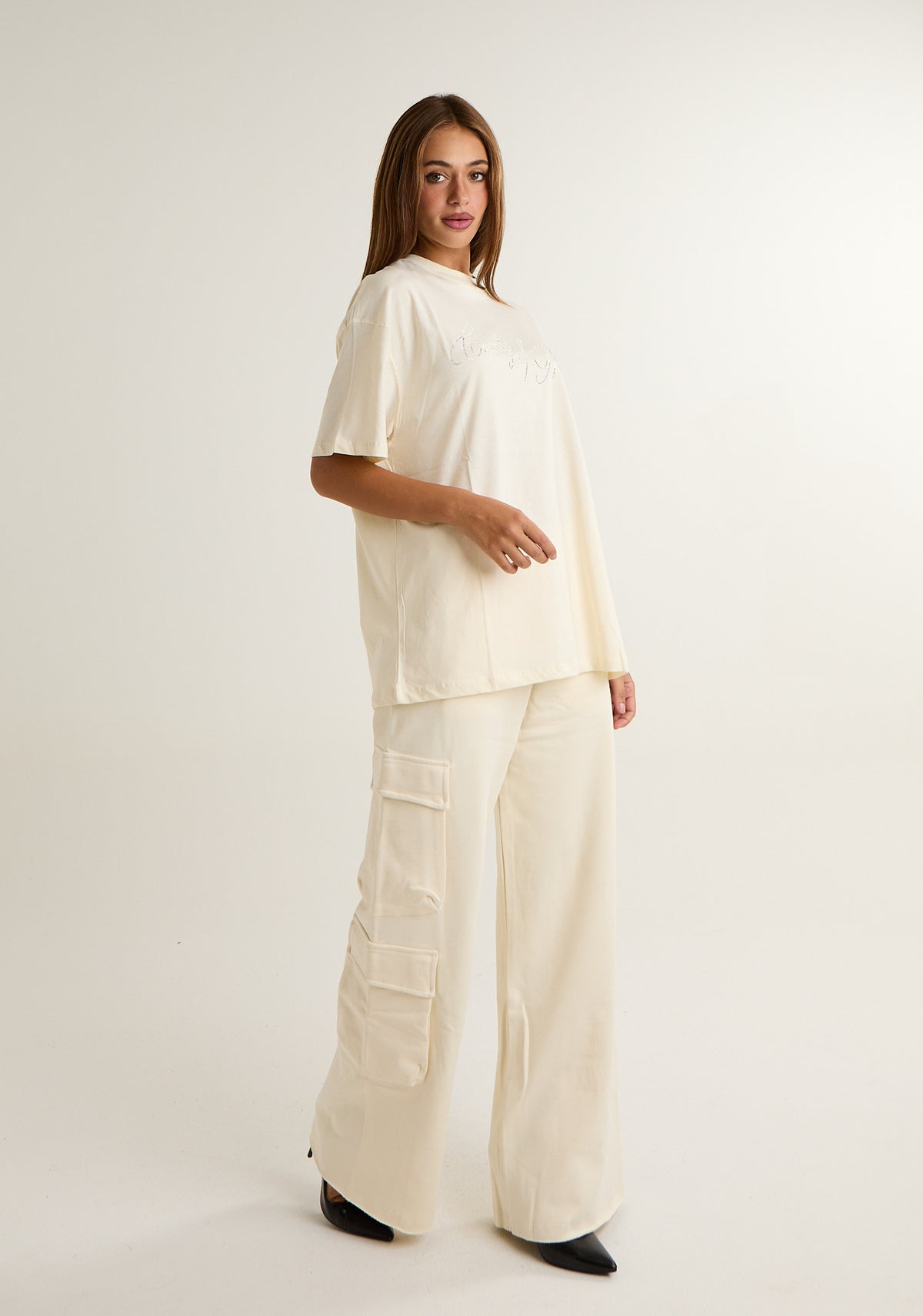 Pantalone con applicazioni laterali logate