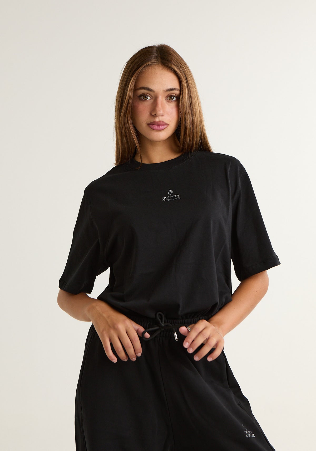 T-shirt con applicazioni posteriori