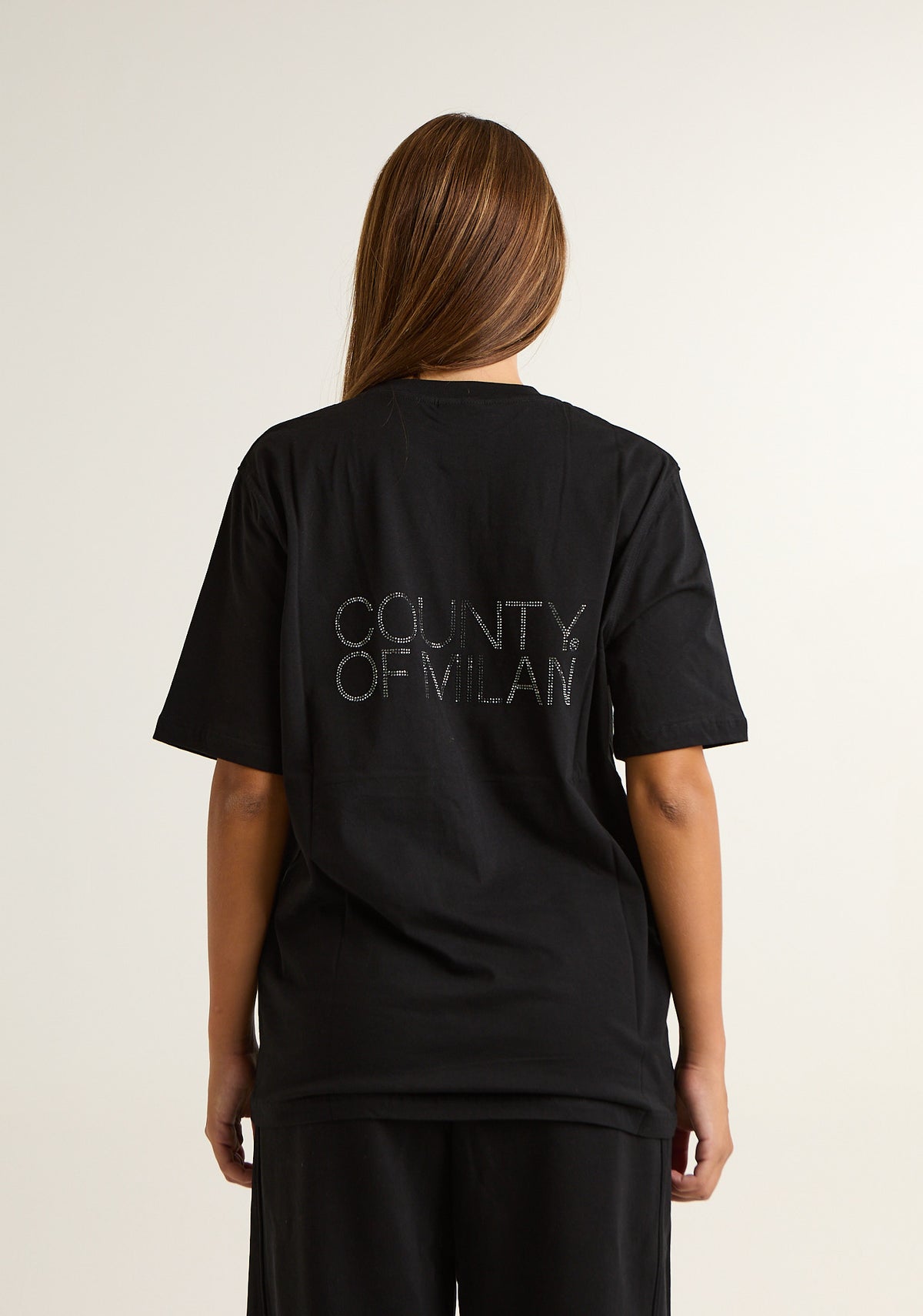 T-shirt con applicazioni posteriori