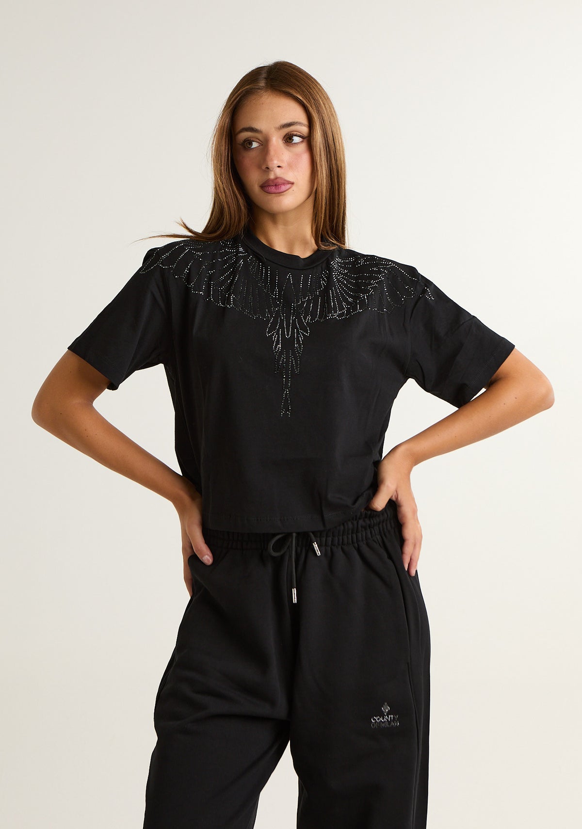 T-shirt con ali preziose