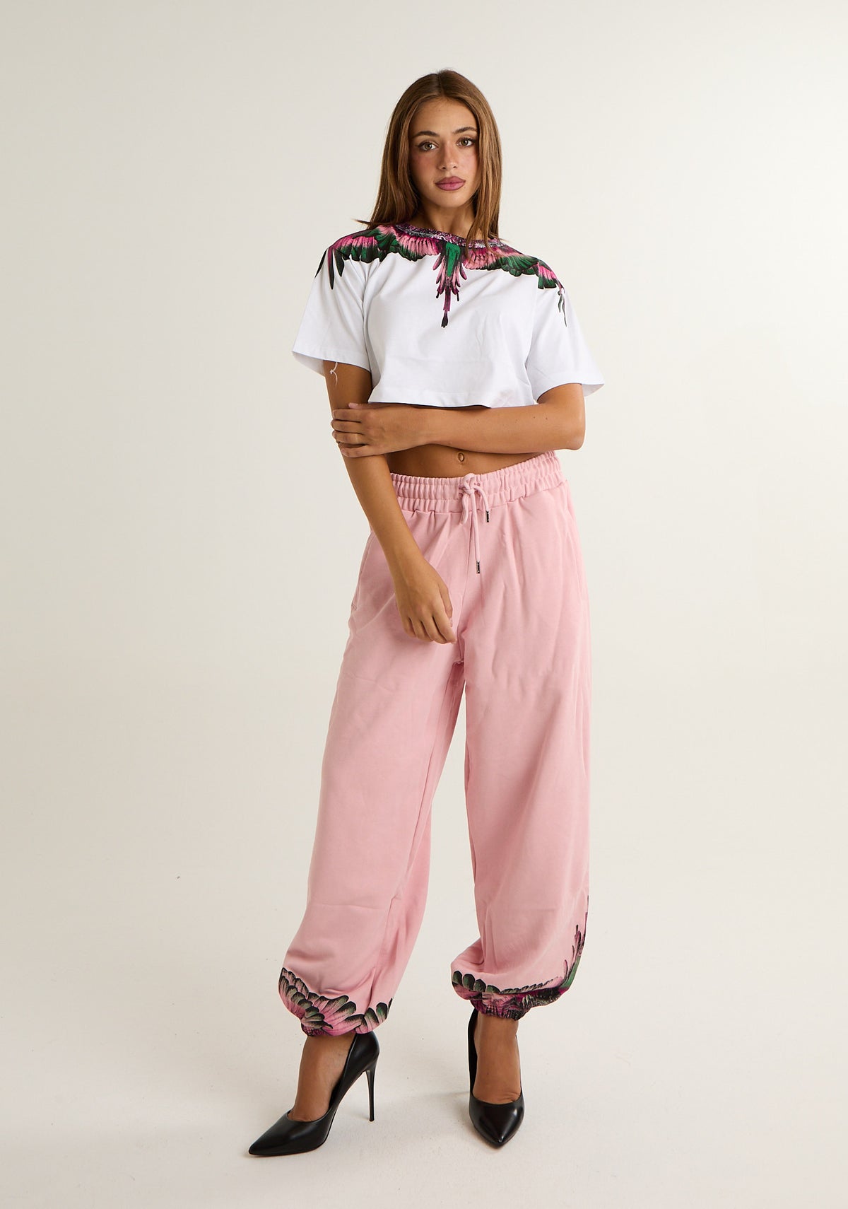 Pantalone tuta con ali colorate