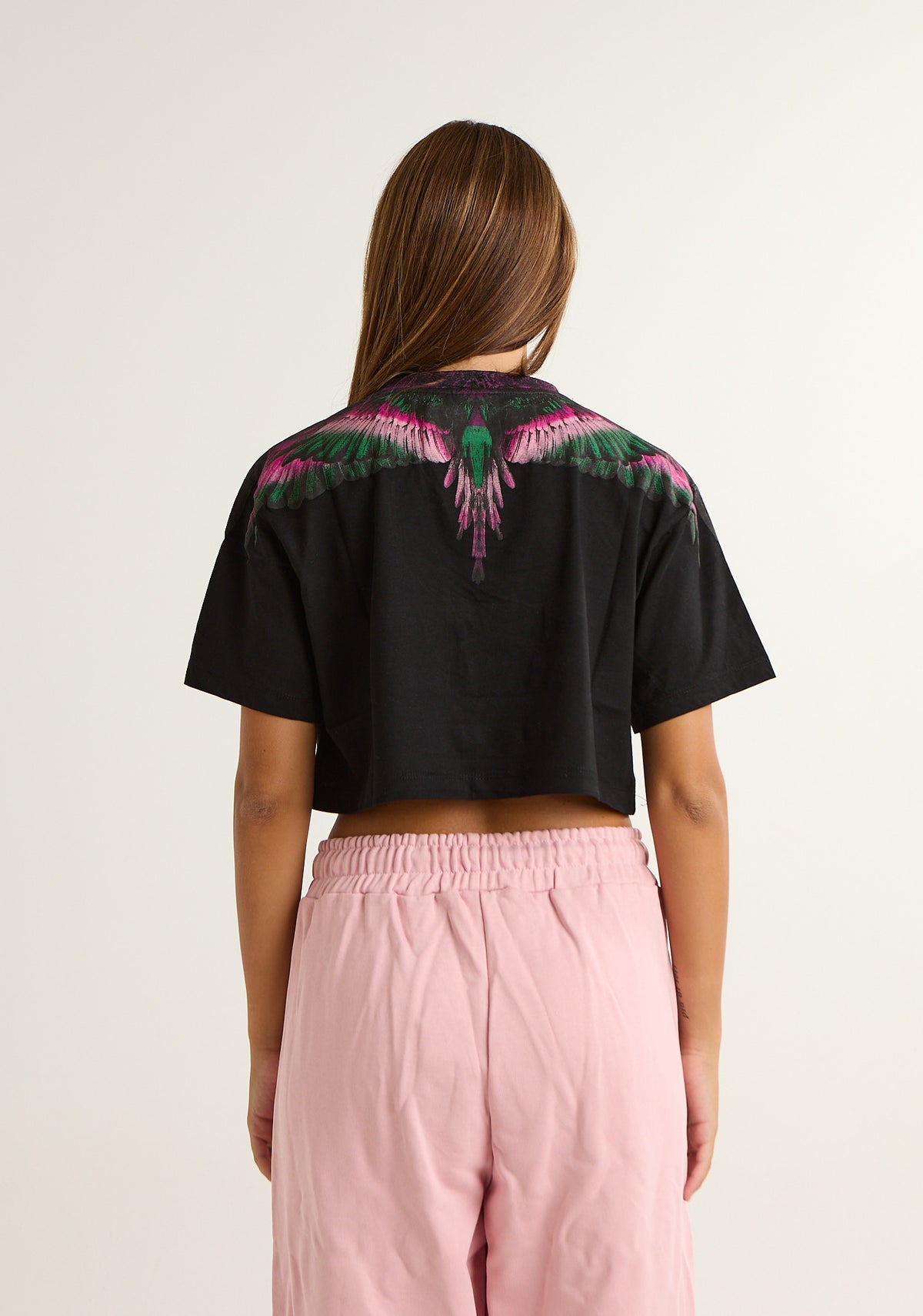 T-shirt crop con ali colorate
