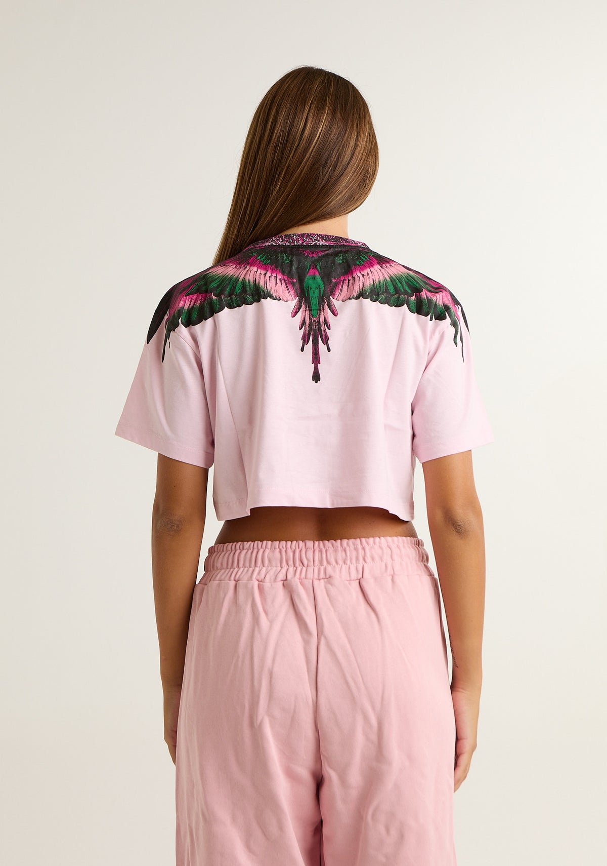 T-shirt crop con ali colorate