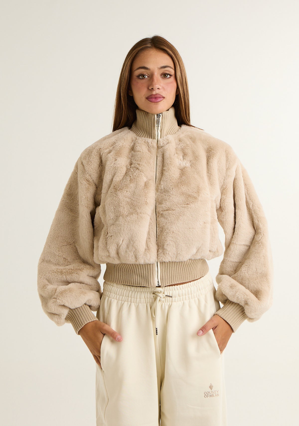 Ecopelliccia con dettagli in maglia