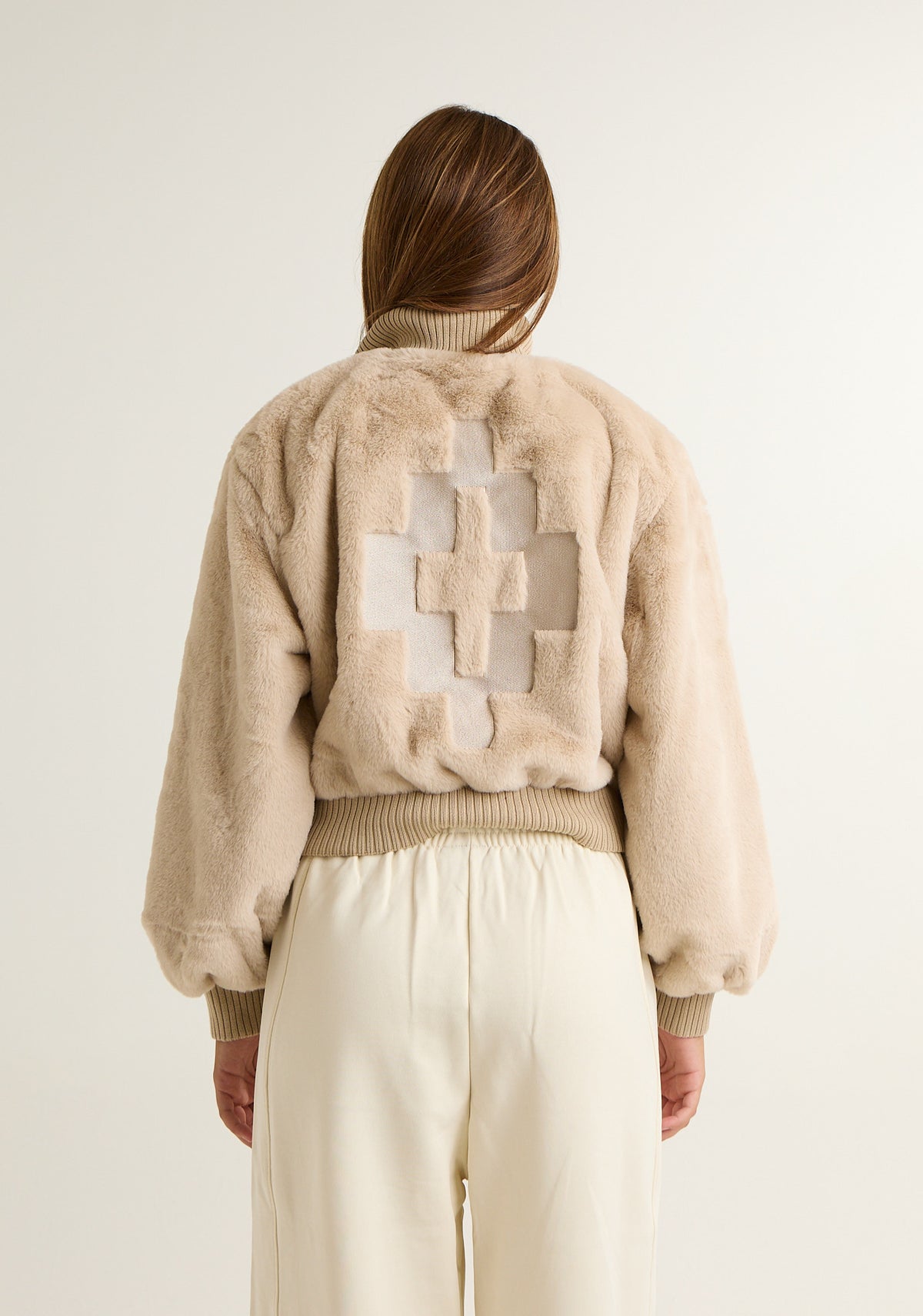 Ecopelliccia con dettagli in maglia