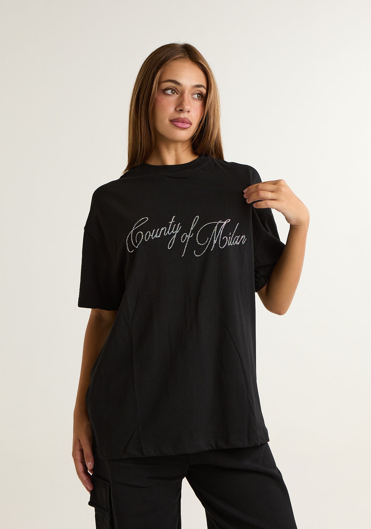 T-shirt con logo prezioso applicato