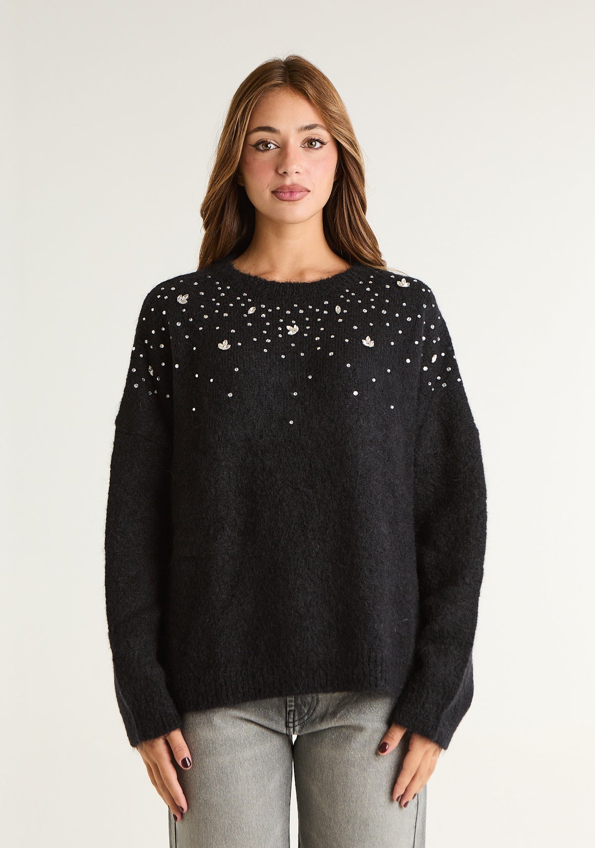 Maglione con applicazioni frontali