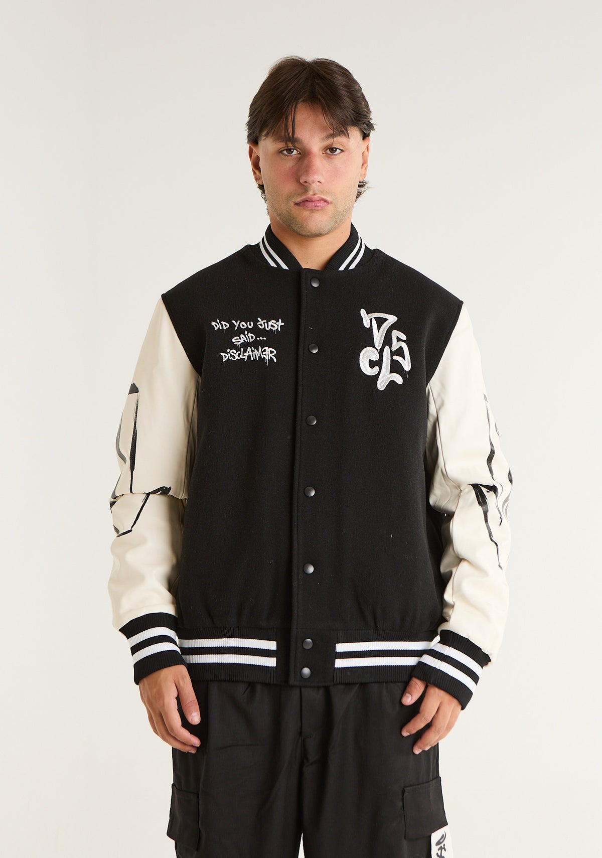 Bomber college con maniche in ecopelle