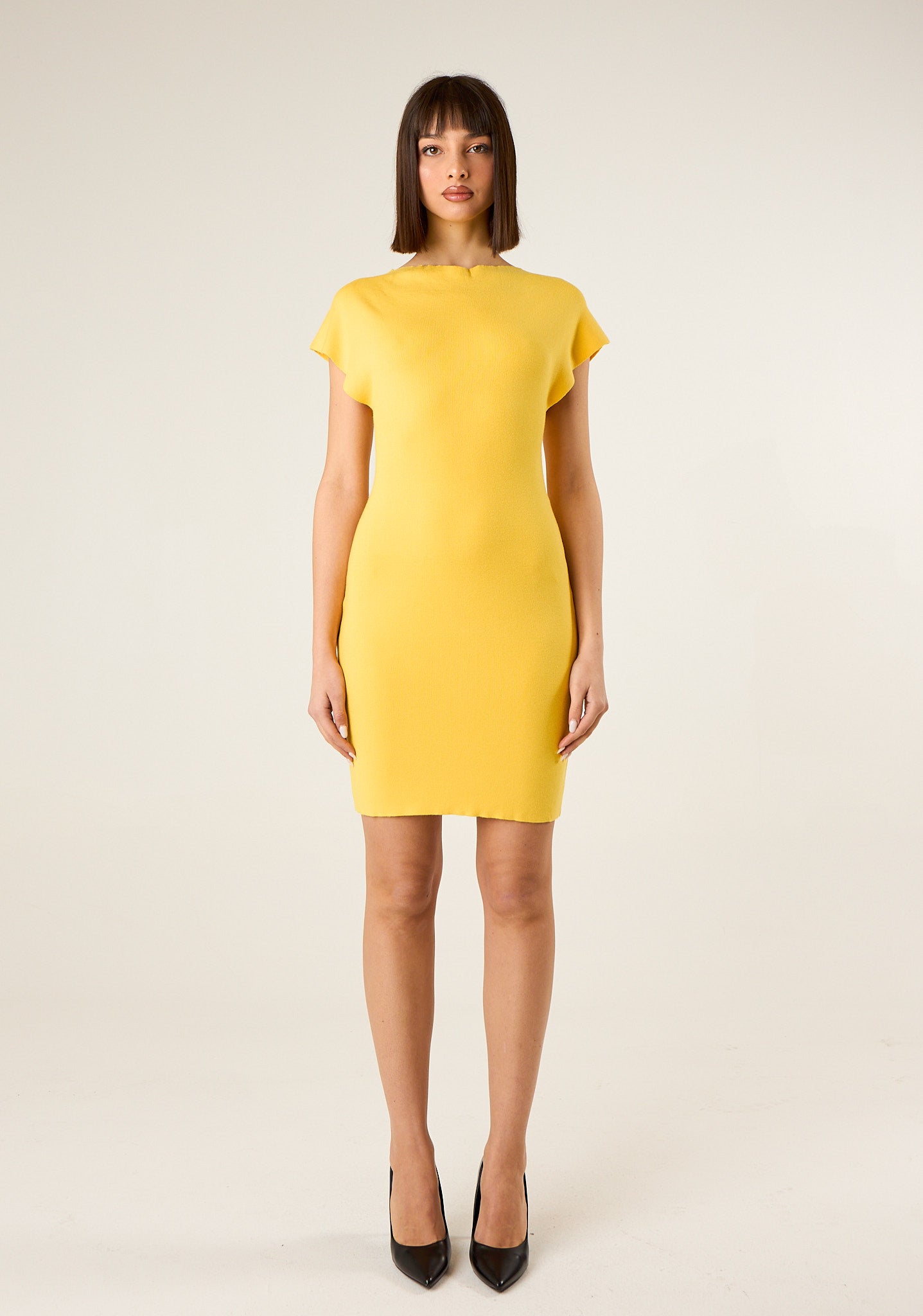 Abito corto in maglia a tinta unita