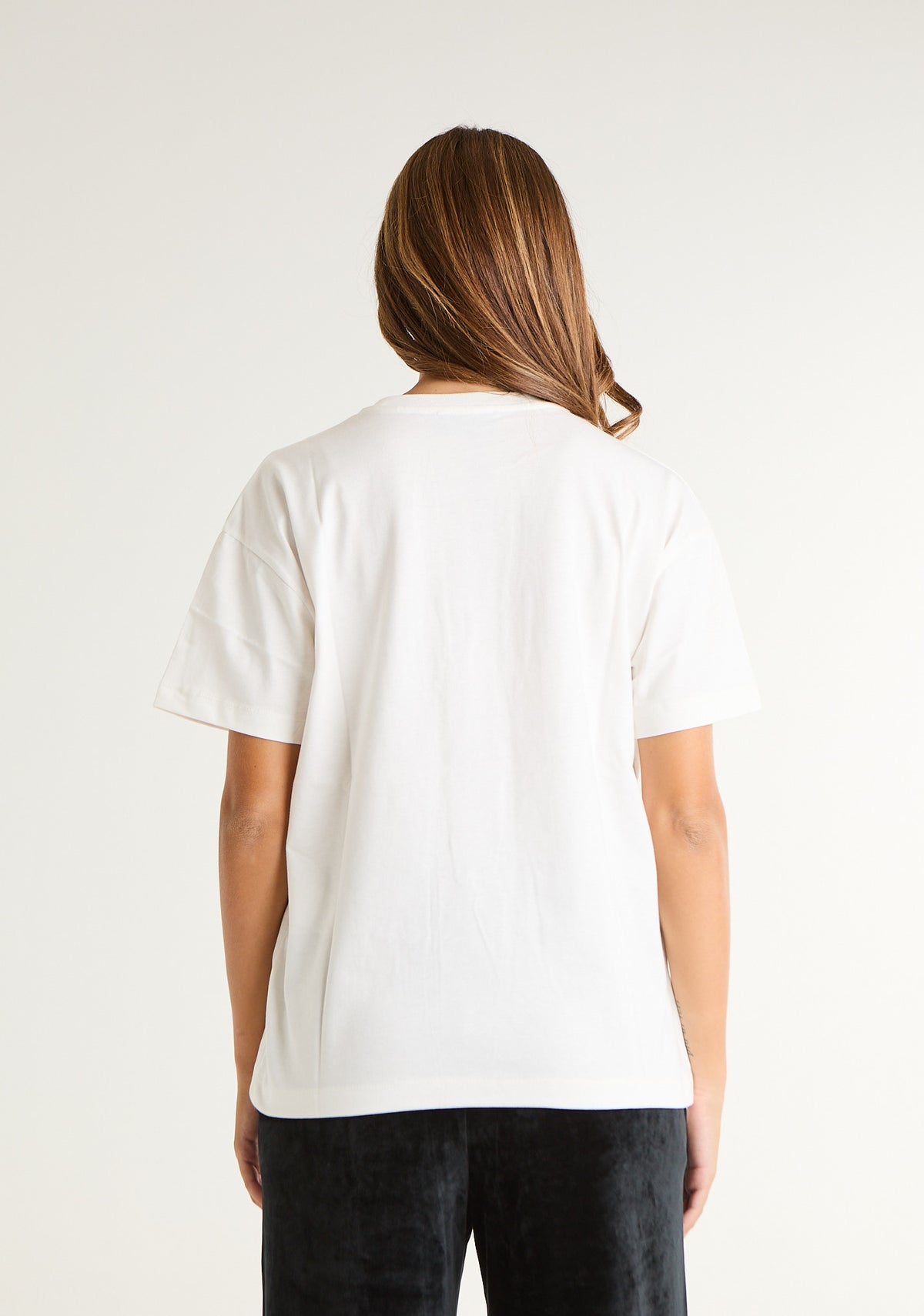 T-shirt con stampa e applicazioni