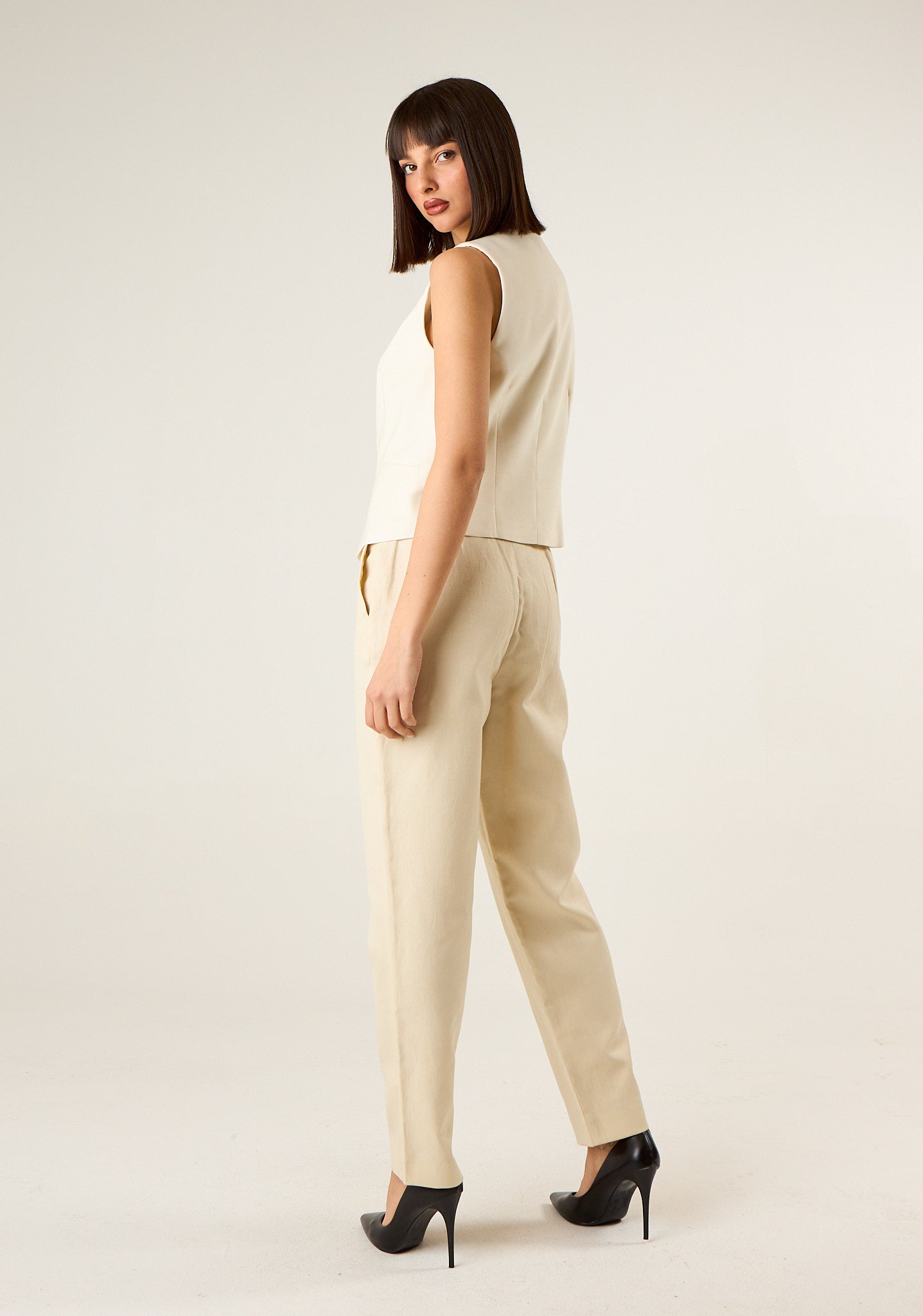 Pantalone con bustino alto