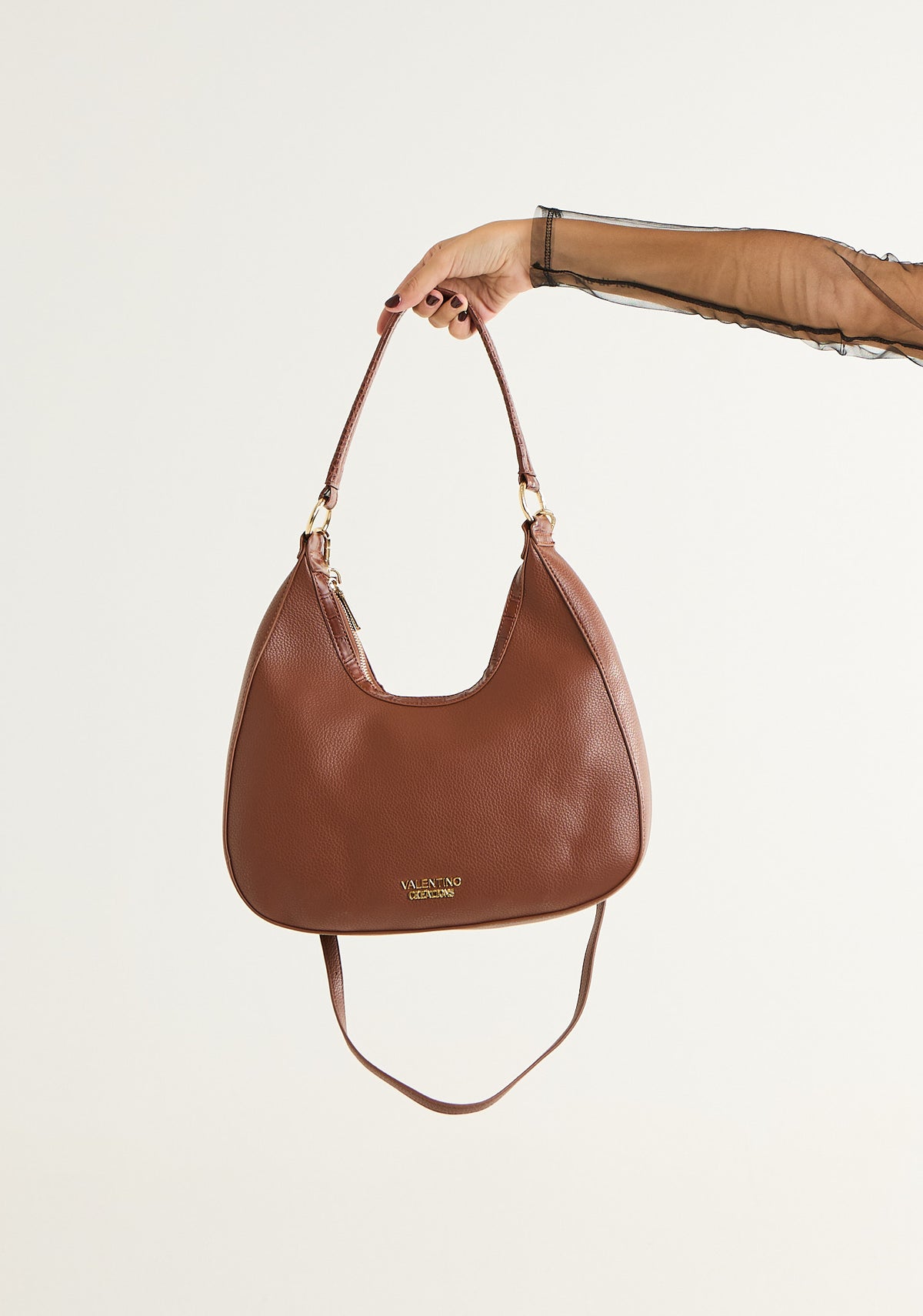 Borsa mezzalunga con tracolla removibile