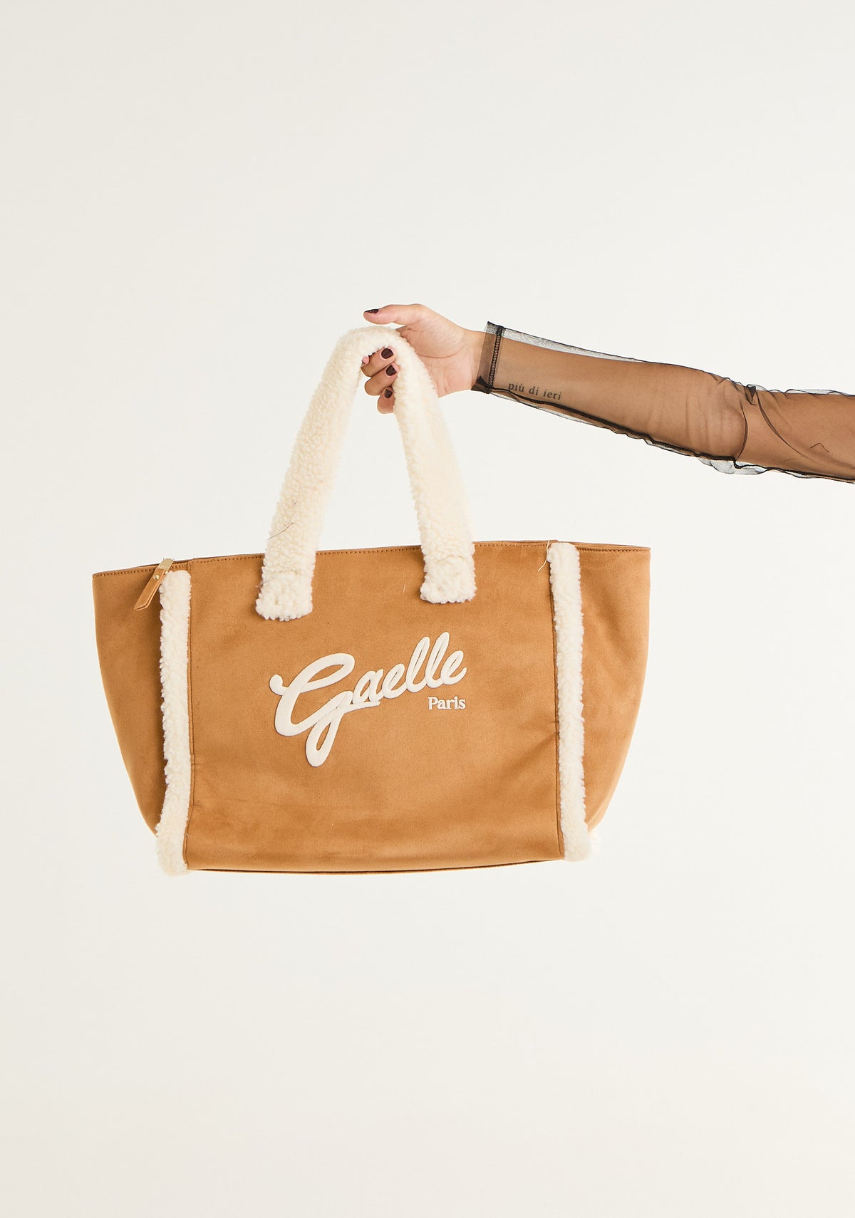 Borsa con inserti in montone