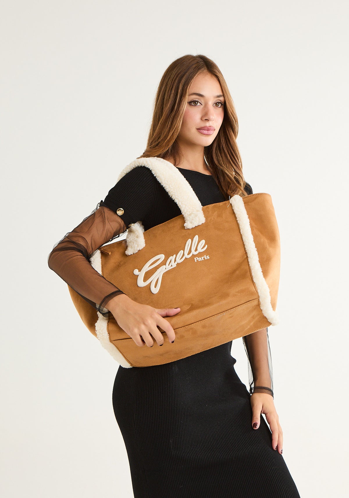 Borsa con inserti in montone