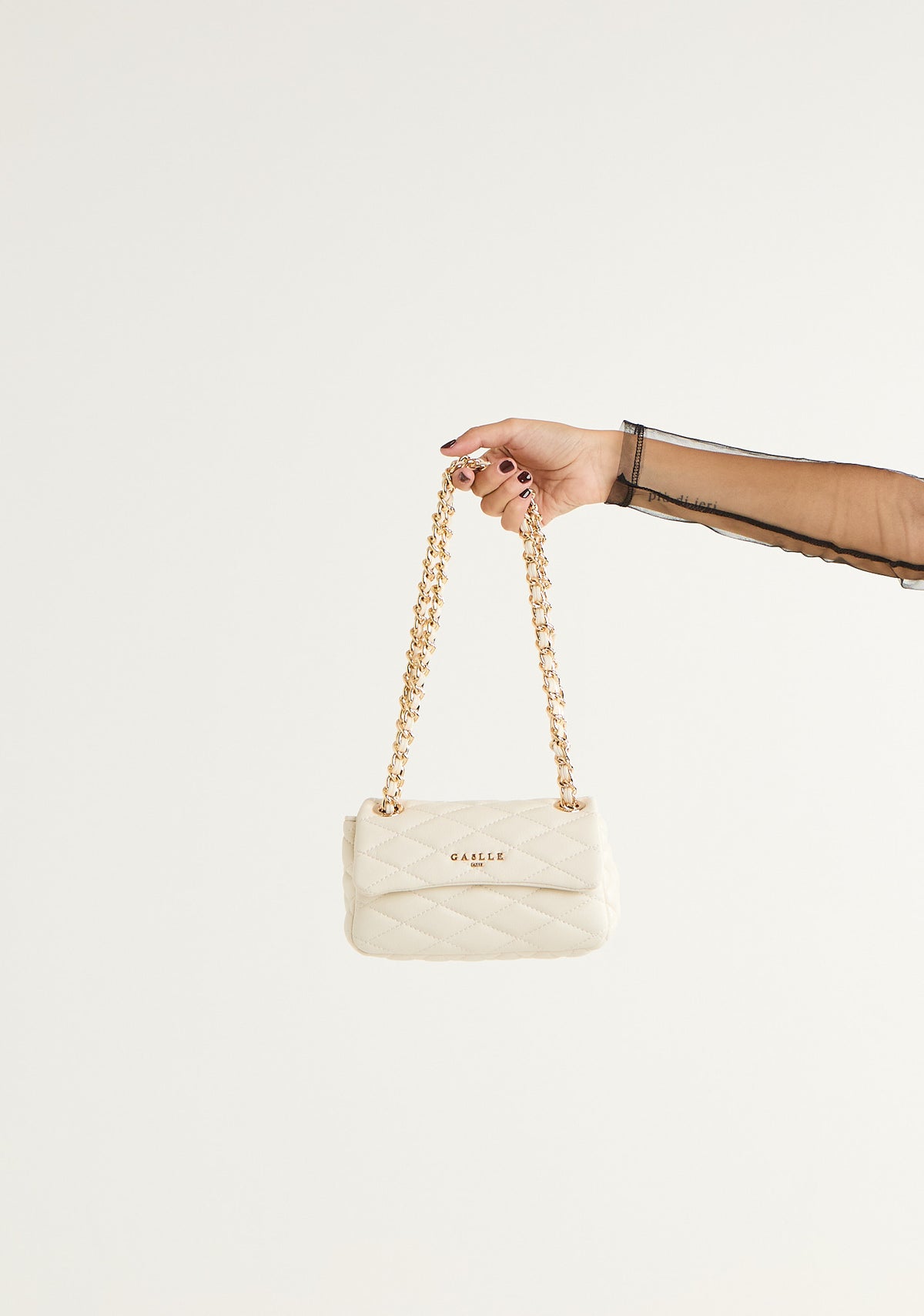 Borsa mini metalasse' con tracolla in catena
