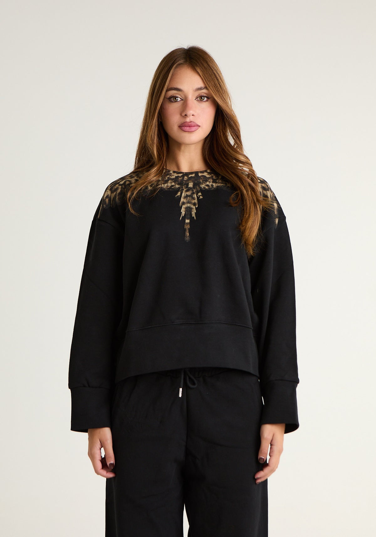 Felpa girocollo con ali animalier