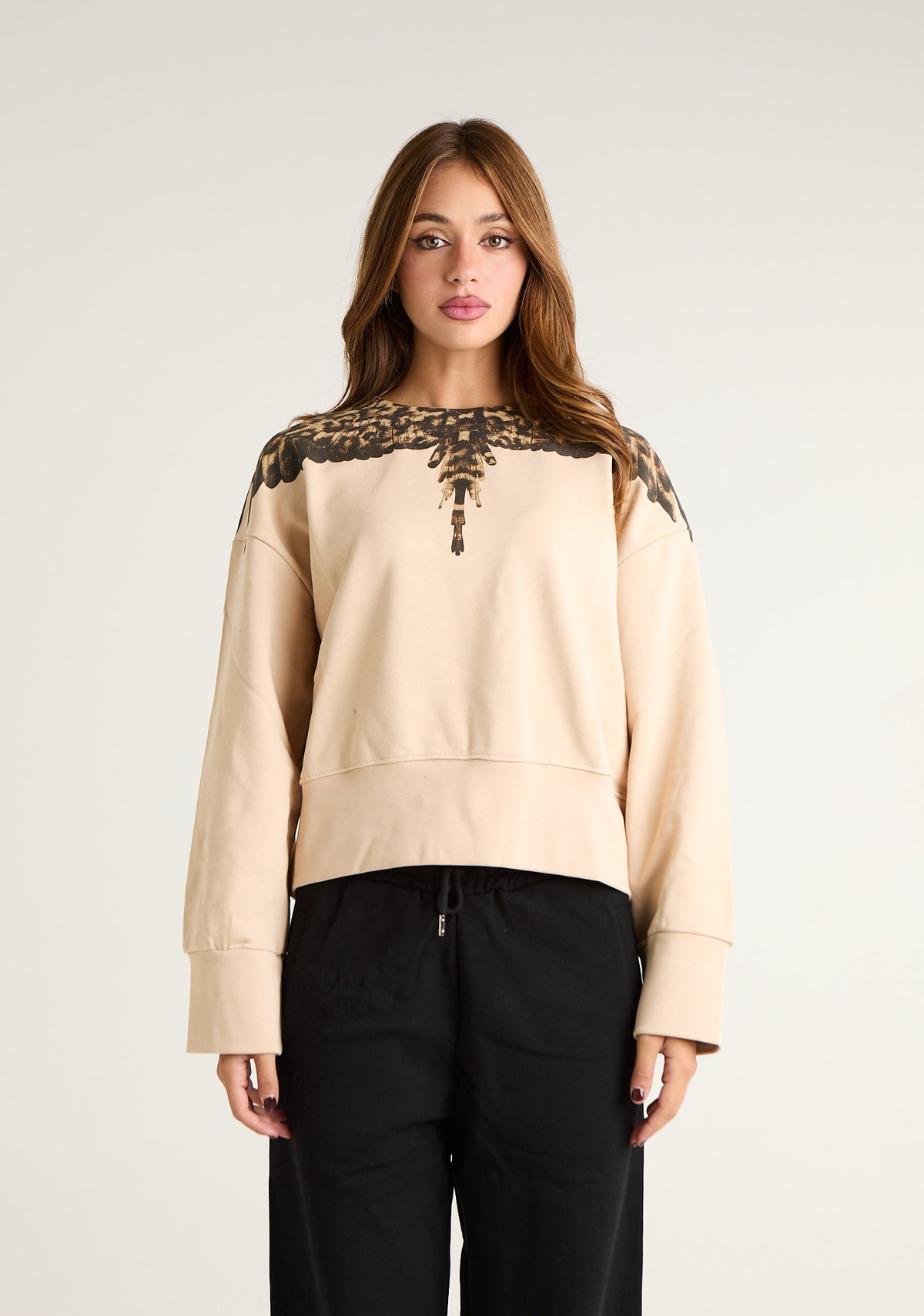 Felpa girocollo con ali animalier