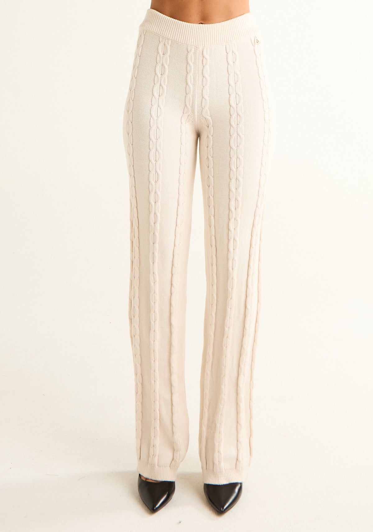 Pantalone in maglia con lavorazione a trecce