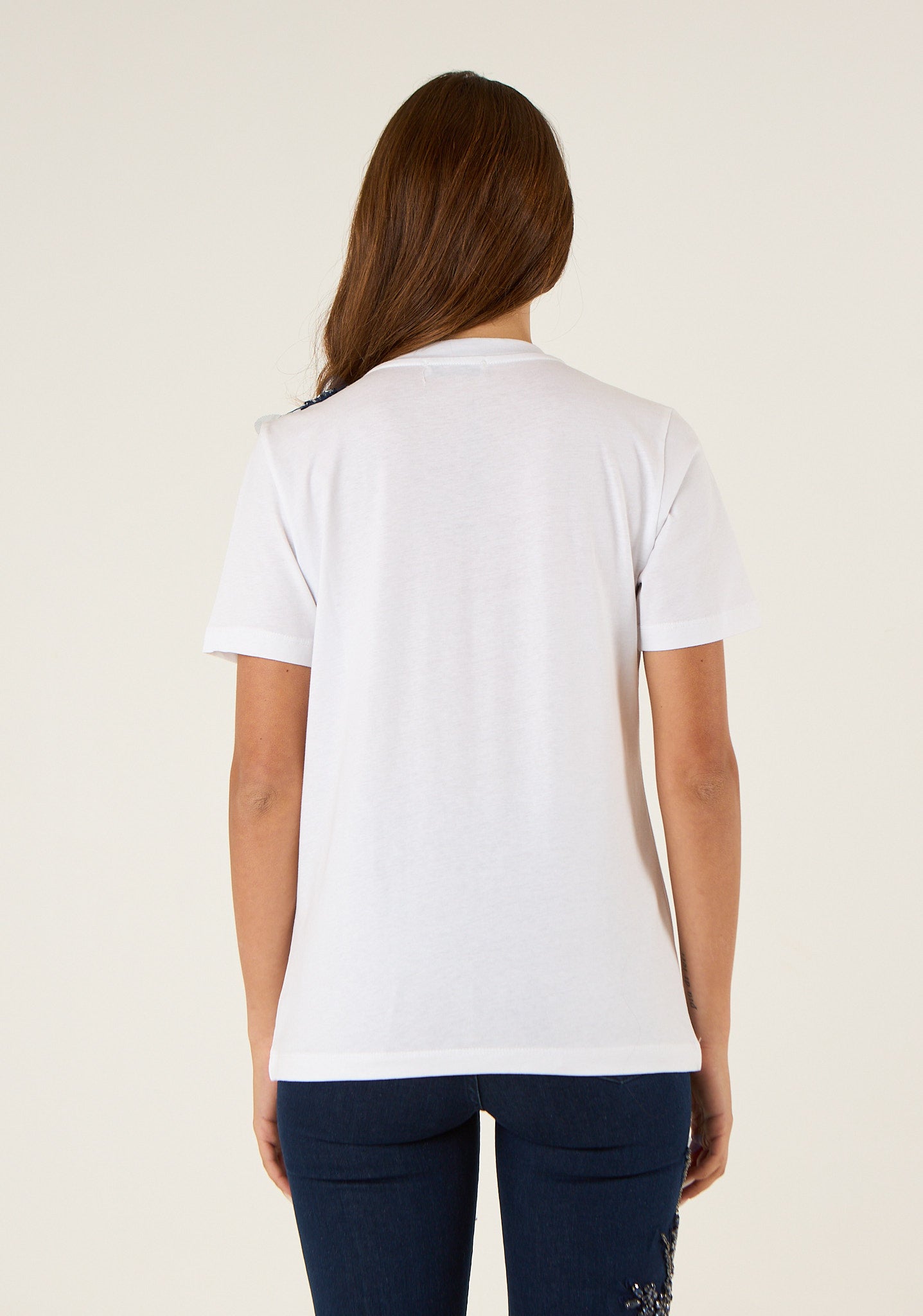 T-shirt con applicazione preziosa