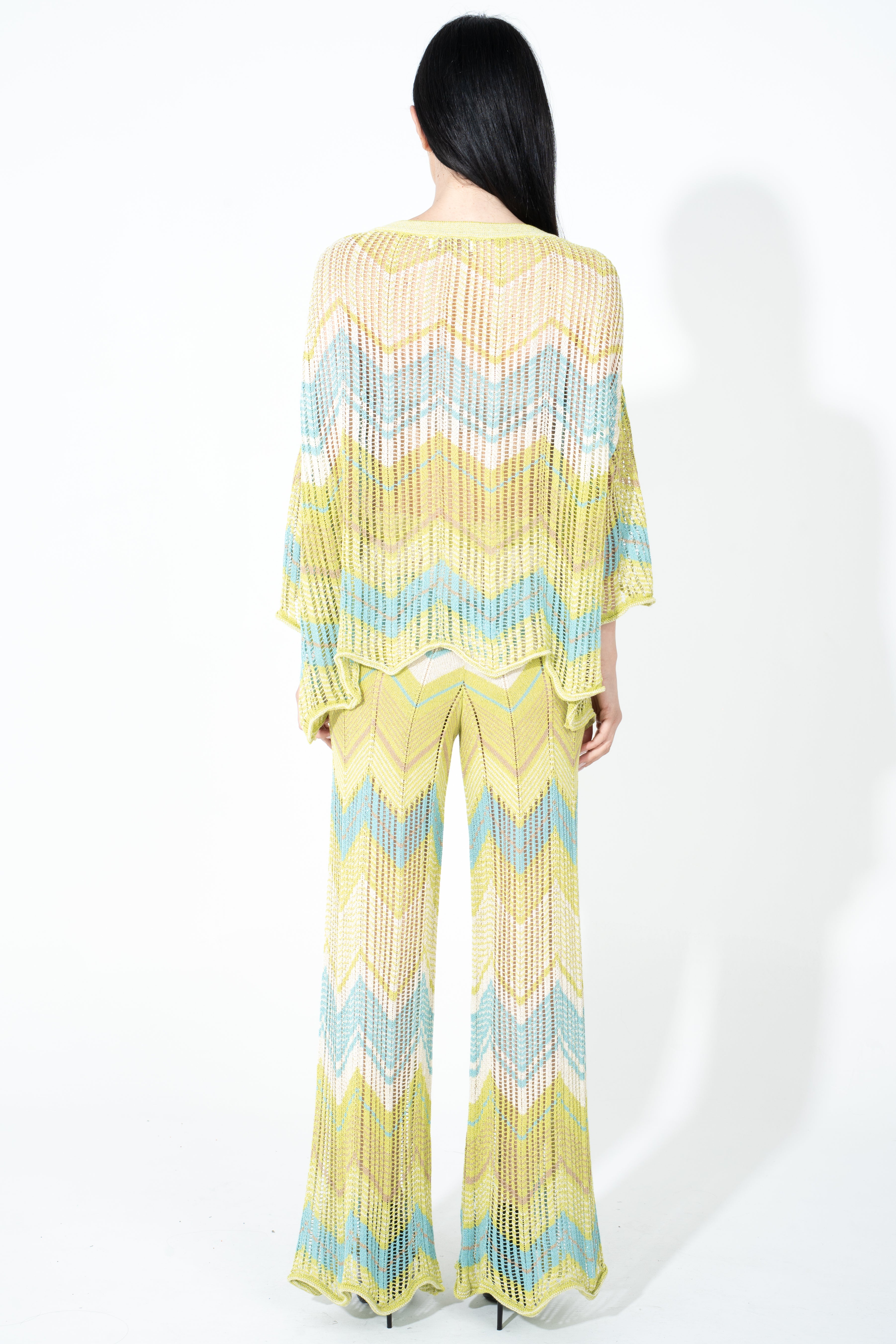 Pantalone in maglia traforata con fondo stondato