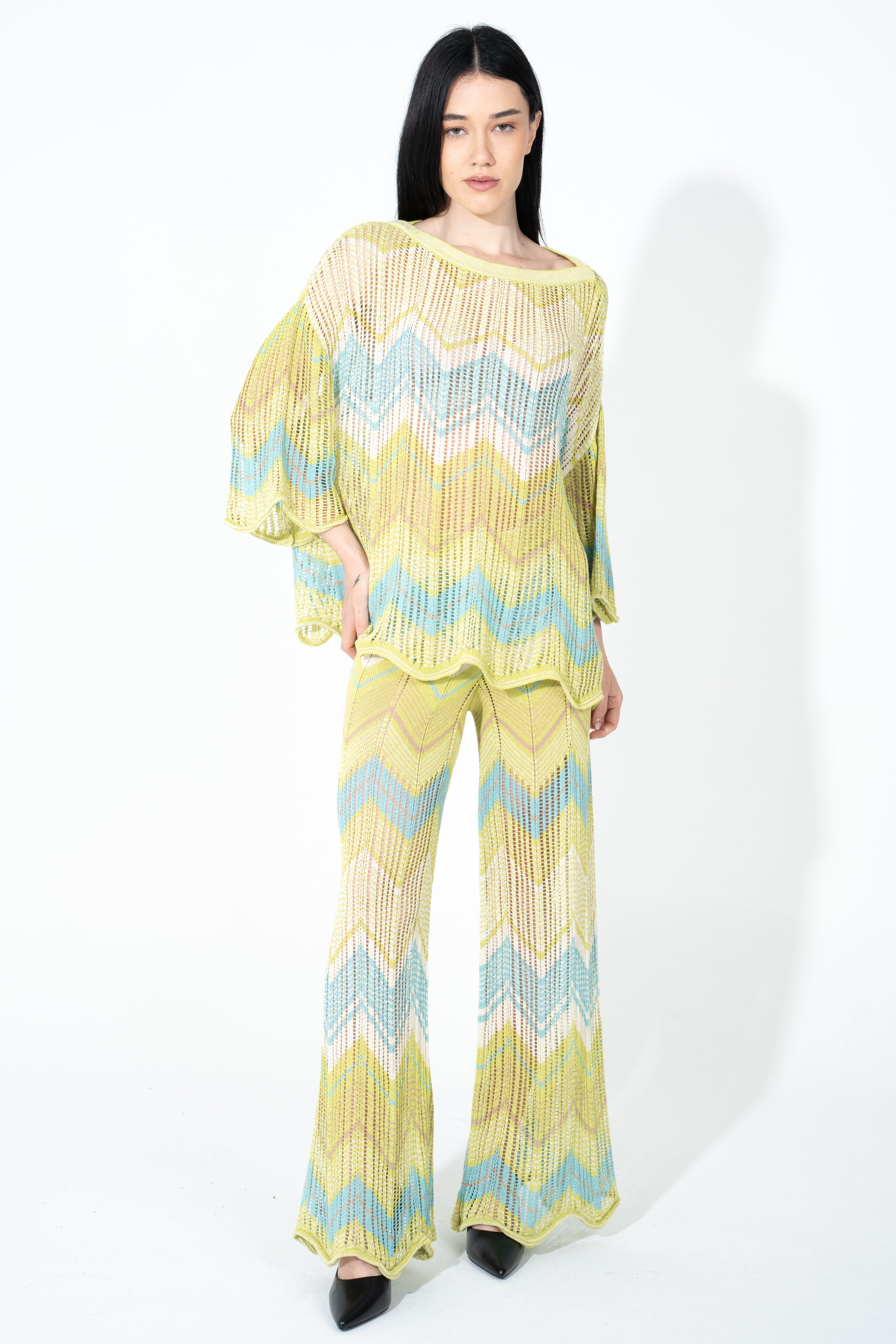 Pantalone in maglia traforata con fondo stondato