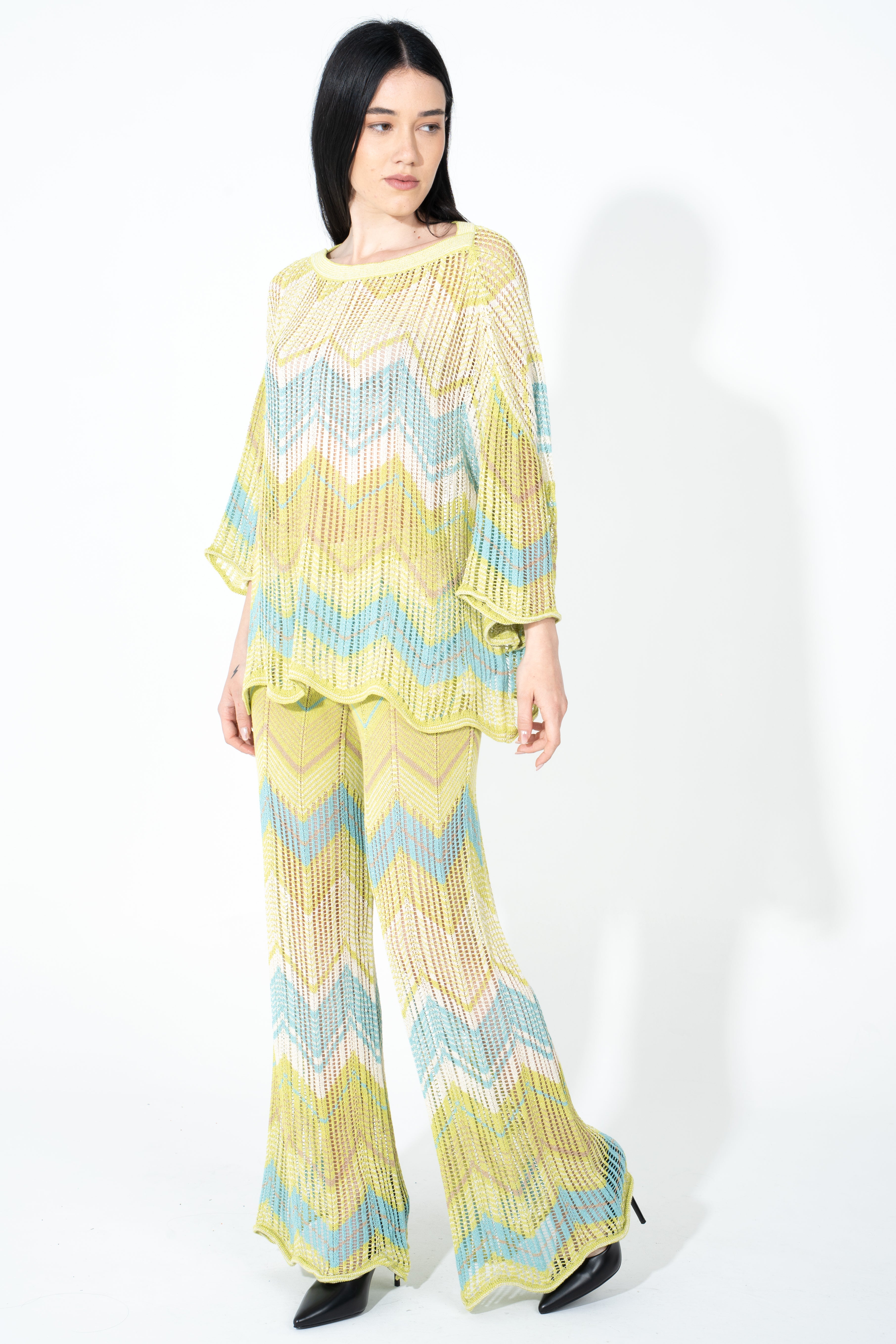 Pantalone in maglia traforata con fondo stondato