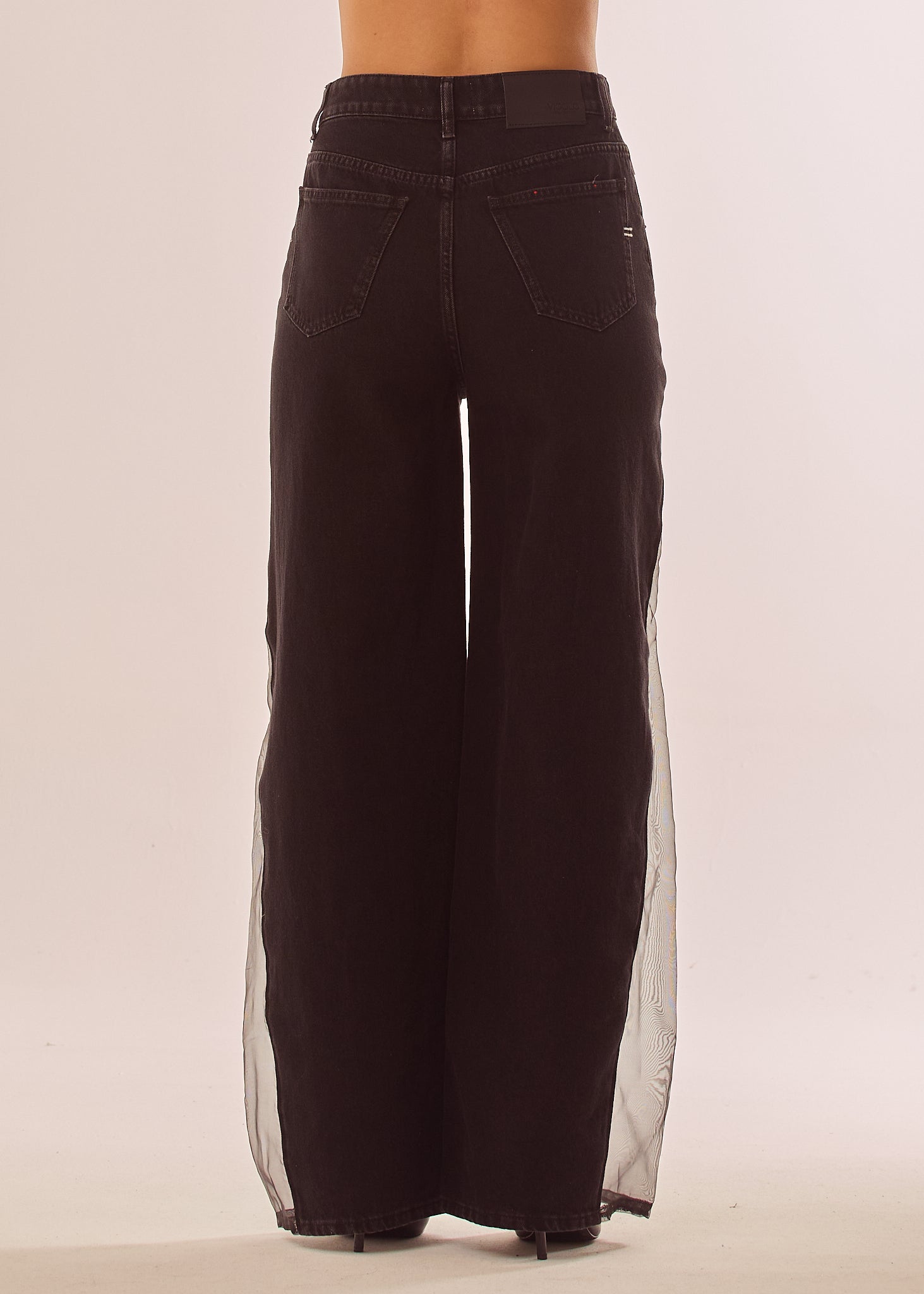 Jeans palazzo con inserti velati