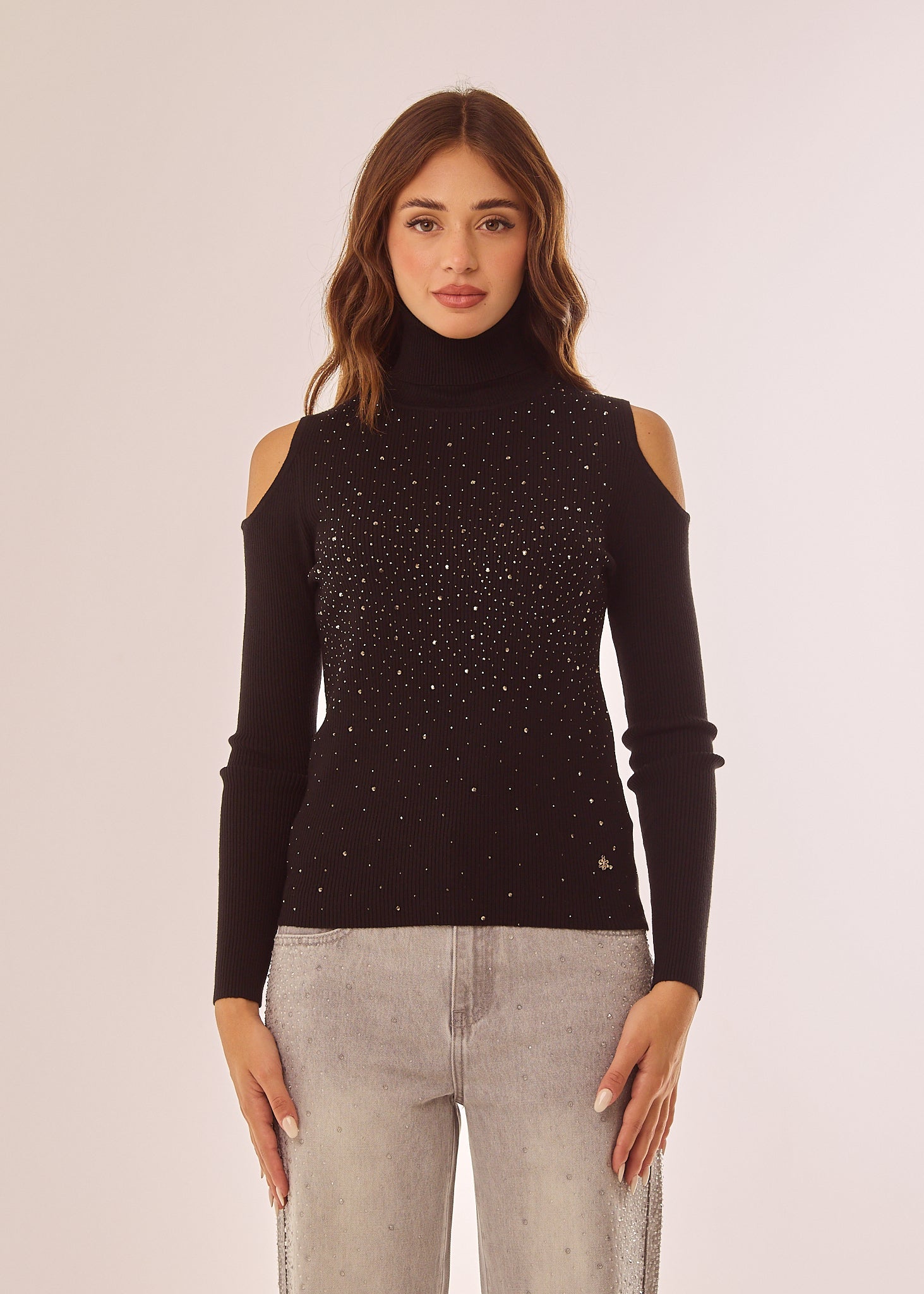 Maglia dolcevita con applicazioni