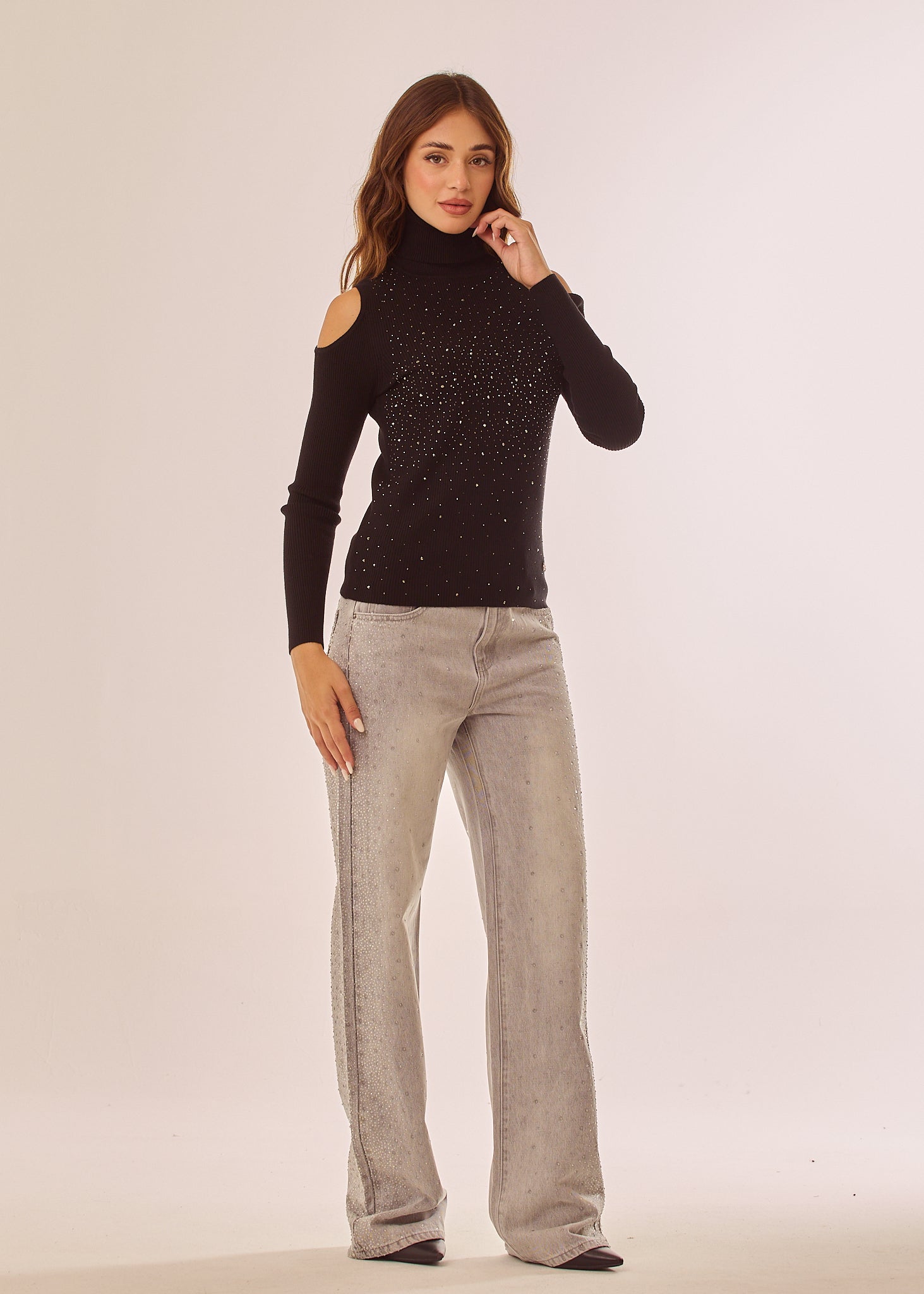 Maglia dolcevita con applicazioni