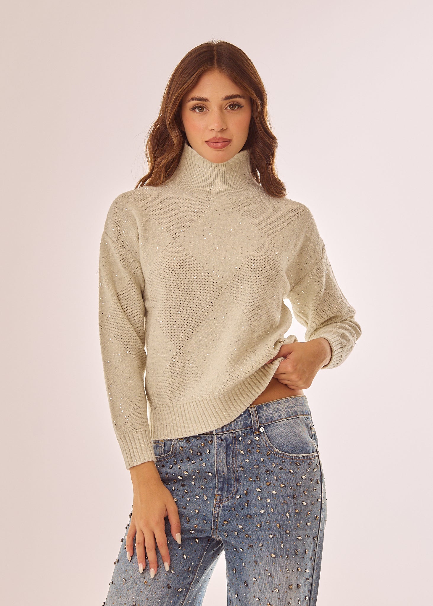 Maglia dolcevita con glitter e paillettes